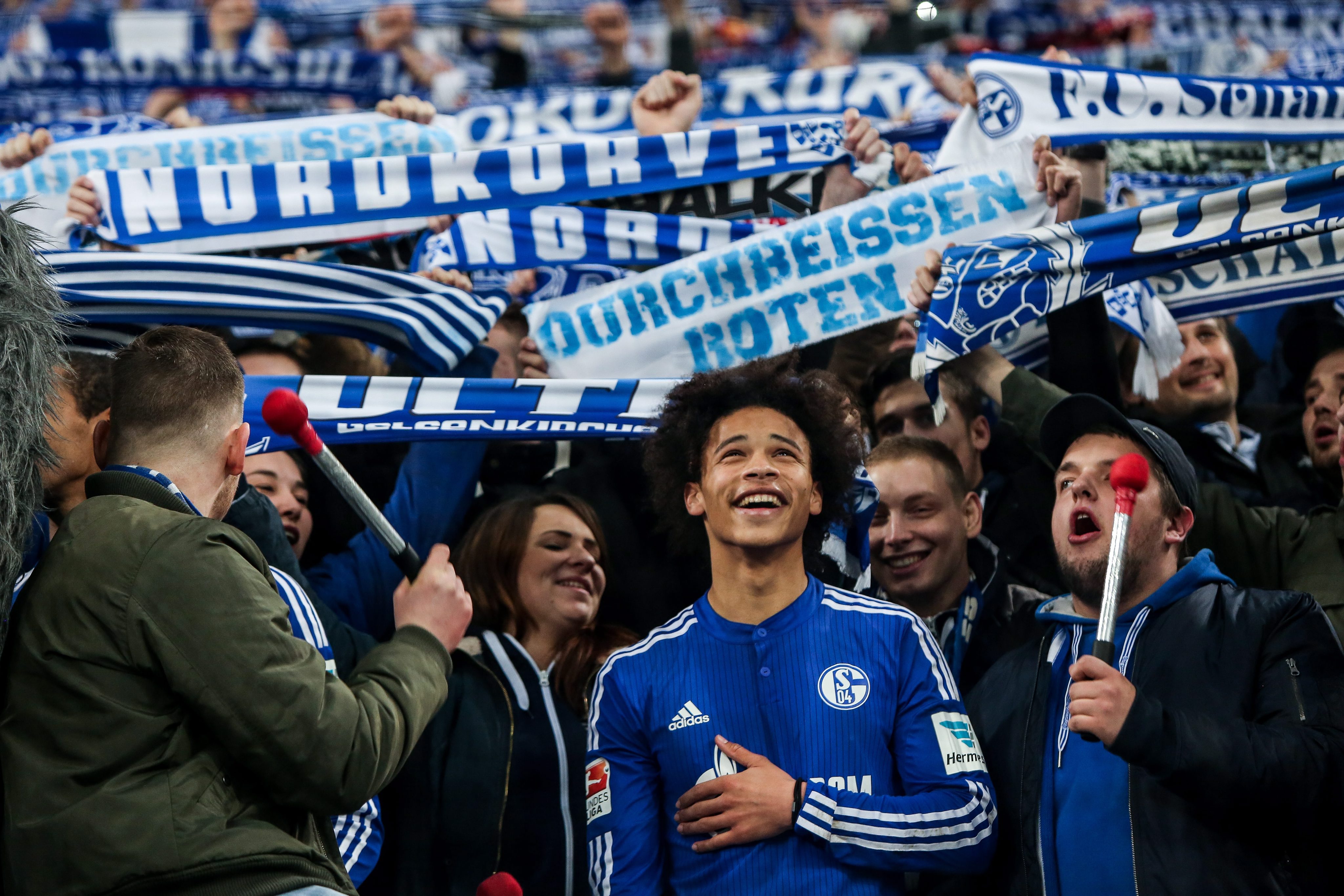 Schalke's Leroy Sane (C) celebrates after the German Bundesliga match between FC Schalke 04 vs Hannover 96 in Gelsenkirchen, Germany, 04 December 2015. 
Picture Credits: EPA/Maja Hitij