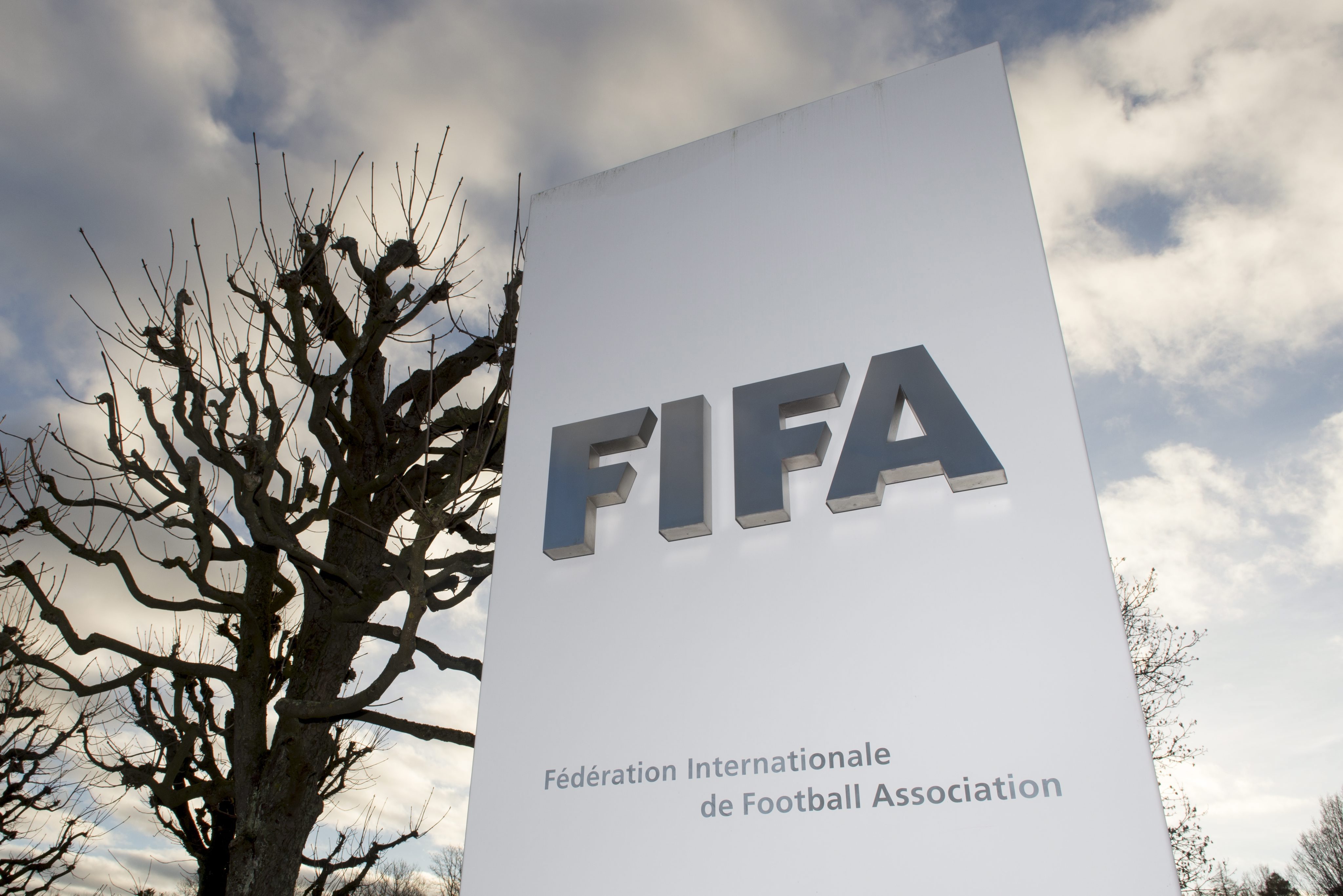 epa05071980 The FIFA logo is pictured outside of the FIFA Headquarters 'Home of FIFA' in Zurich, Switzerland, 17 December 2015. While FIFA President Joseph S. Blatter will appear in person before the panel of four judges of the FIFA ethics court, UEFA President Michel Platini plans to boycott his hearing on 18 December. Blatter and Platini were banned for 90 days on 08 October.  EPA/WALTER BIERI