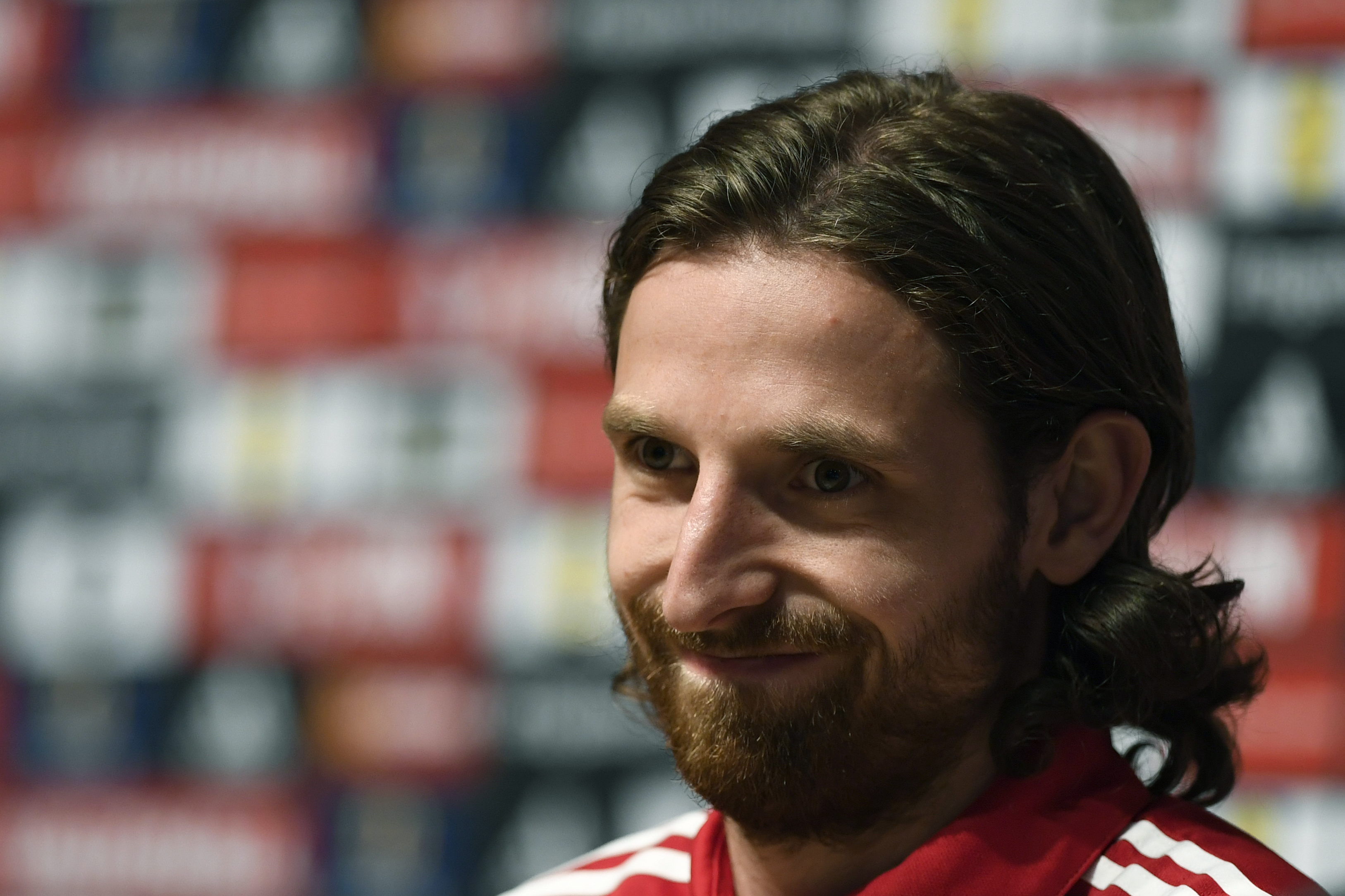 Wales' midfielder Joe Allen attends a press conference in Dinard, Western France, on June 18, 2016, during the Euro 2016 football tournament. / AFP / DAMIEN MEYER (Photo credit should read DAMIEN MEYER/AFP/Getty Images)