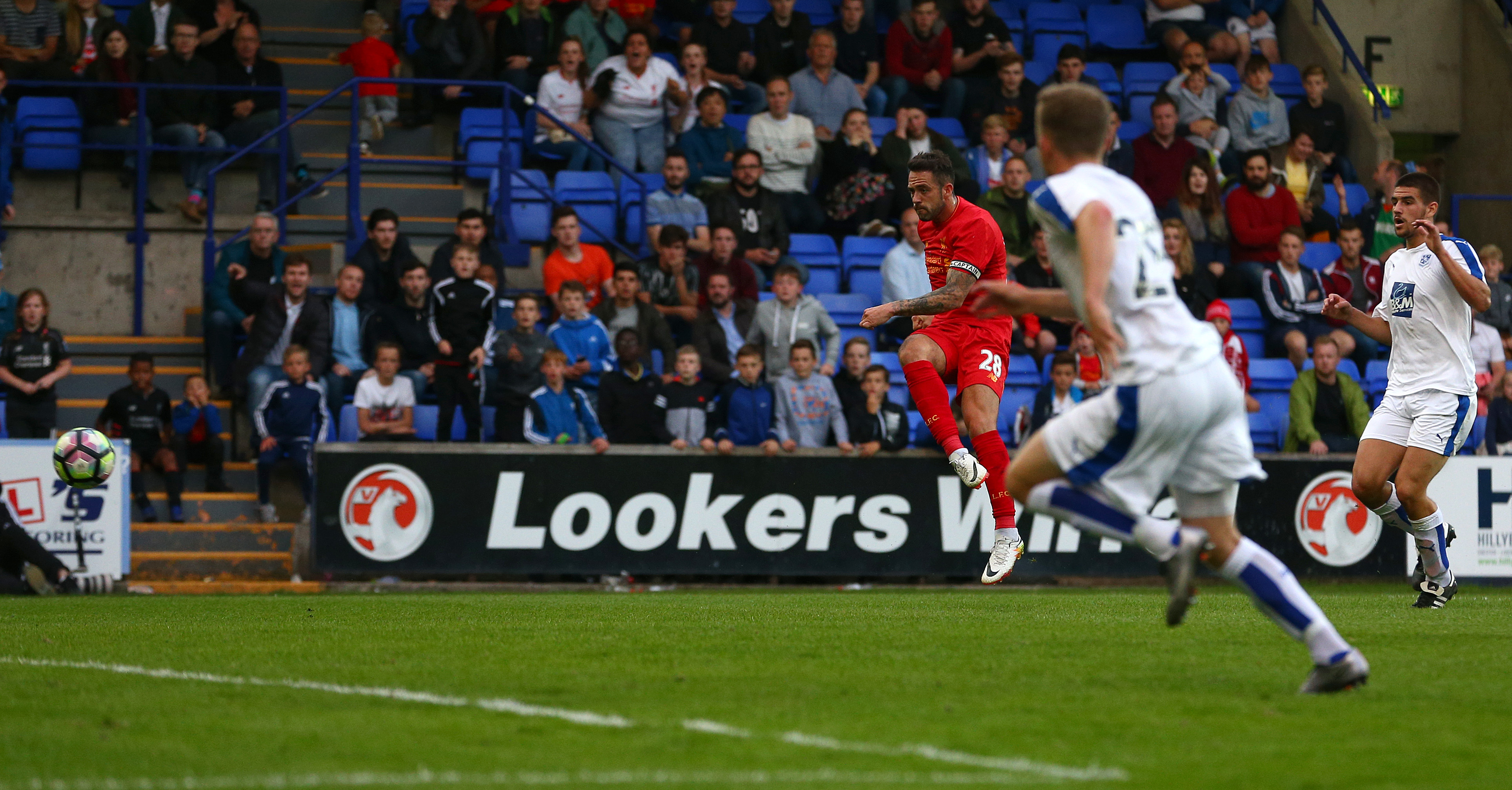 BIRKENHEAD, ENGLAND - JULY 08: Danny Ings of Liverpool scores the only goal of the game during the Pre-Season Friendly match between Tranmere Rovers and Liverpool at Prenton Park on July 8, 2016 in Birkenhead, England. (Photo by Dave Thompson/Getty Images)