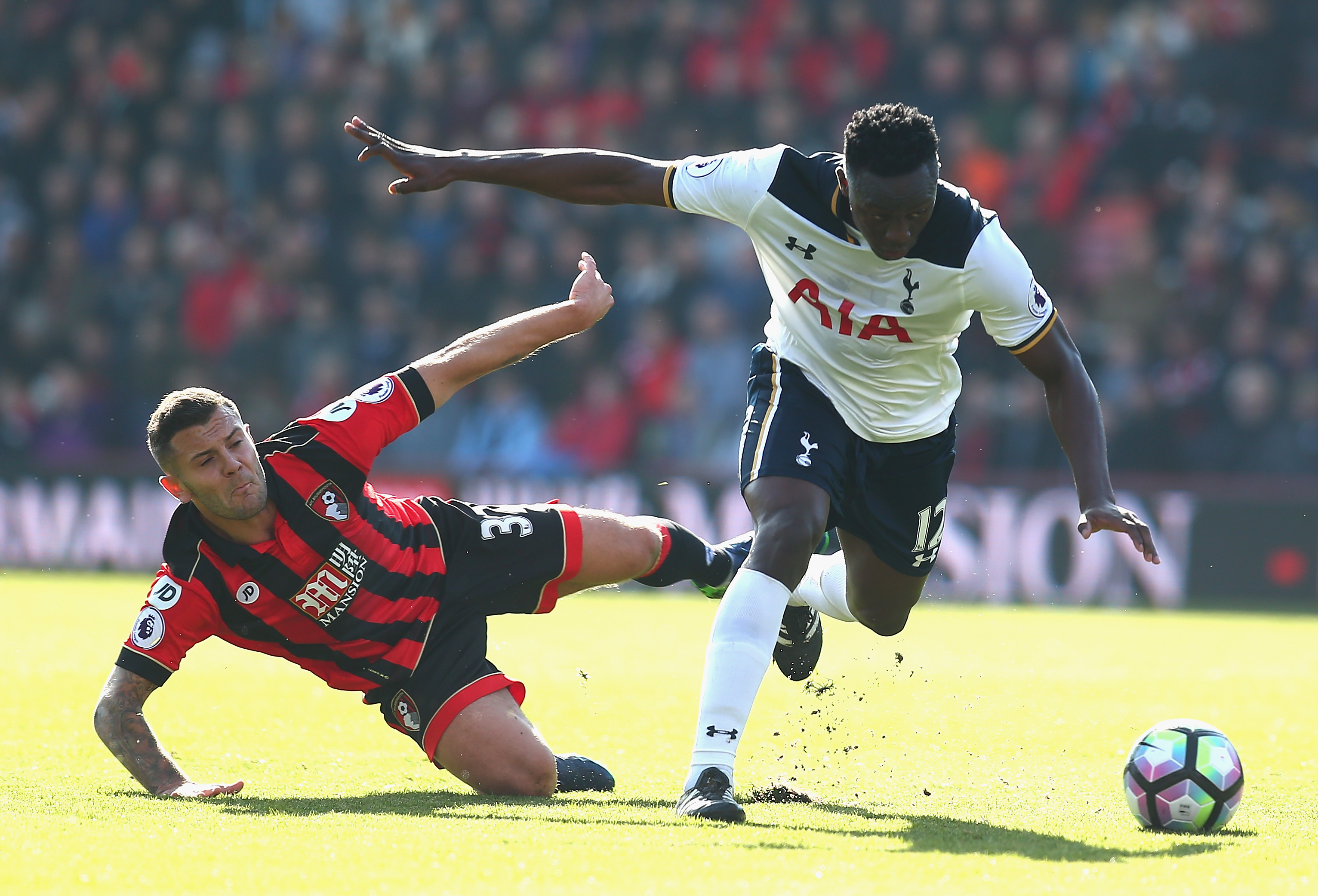 BOURNEMOUTH, ENGLAND - OCTOBER 22:  Jack Wilshere of AFC Bournemouth (L) and Victor Wanyama of Tottenham Hotspur (R) battle for possession during the Premier League match between AFC Bournemouth and Tottenham Hotspur at Vitality Stadium on October 22, 2016 in Bournemouth, England.  (Photo by Charlie Crowhurst/Getty Images)