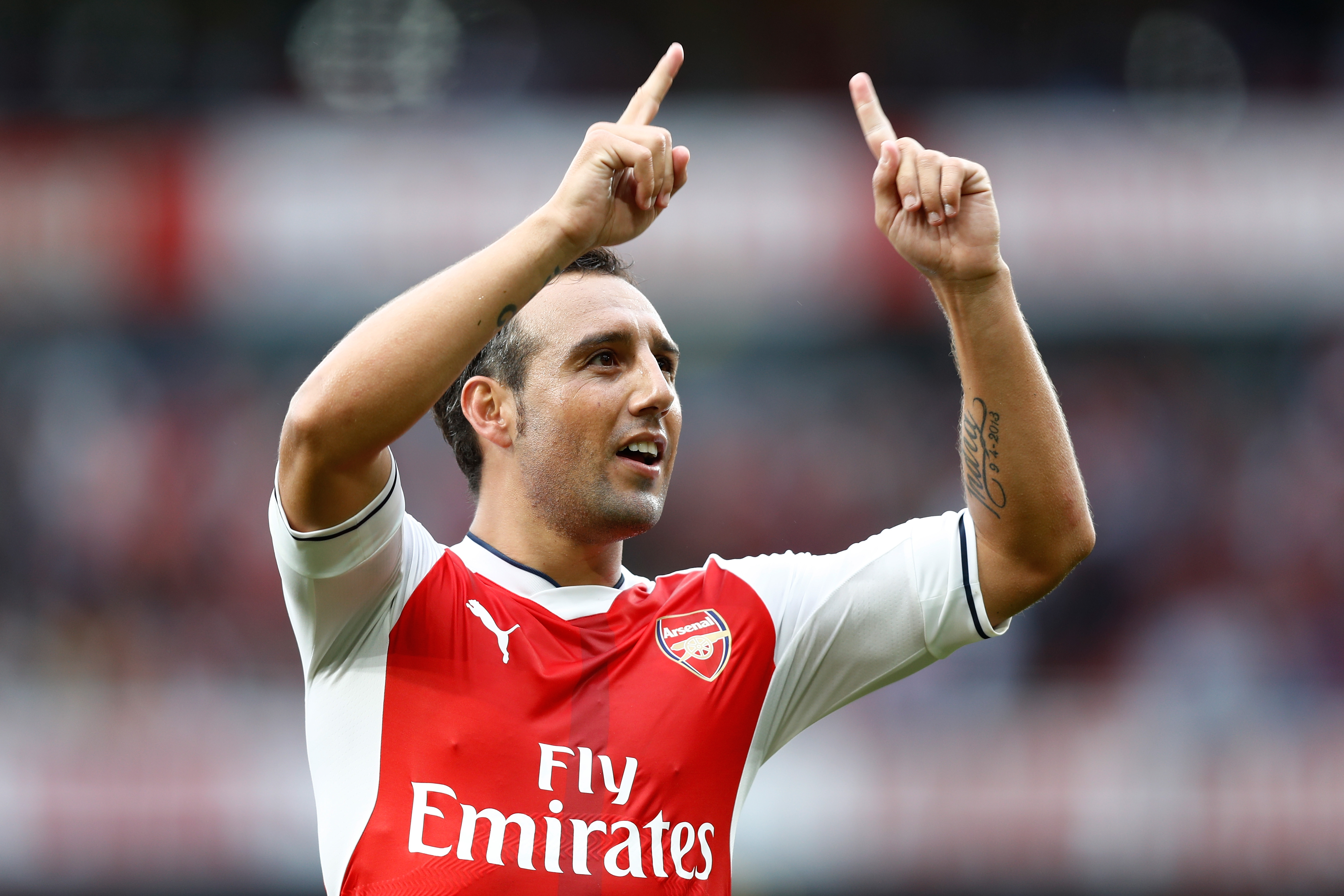 LONDON, ENGLAND - SEPTEMBER 10:  Santi Cazorla of Arsenal celebrates scoring his sides second goal during the Premier League match between Arsenal and Southampton at Emirates Stadium on September 10, 2016 in London, England.  (Photo by Clive Rose/Getty Images)