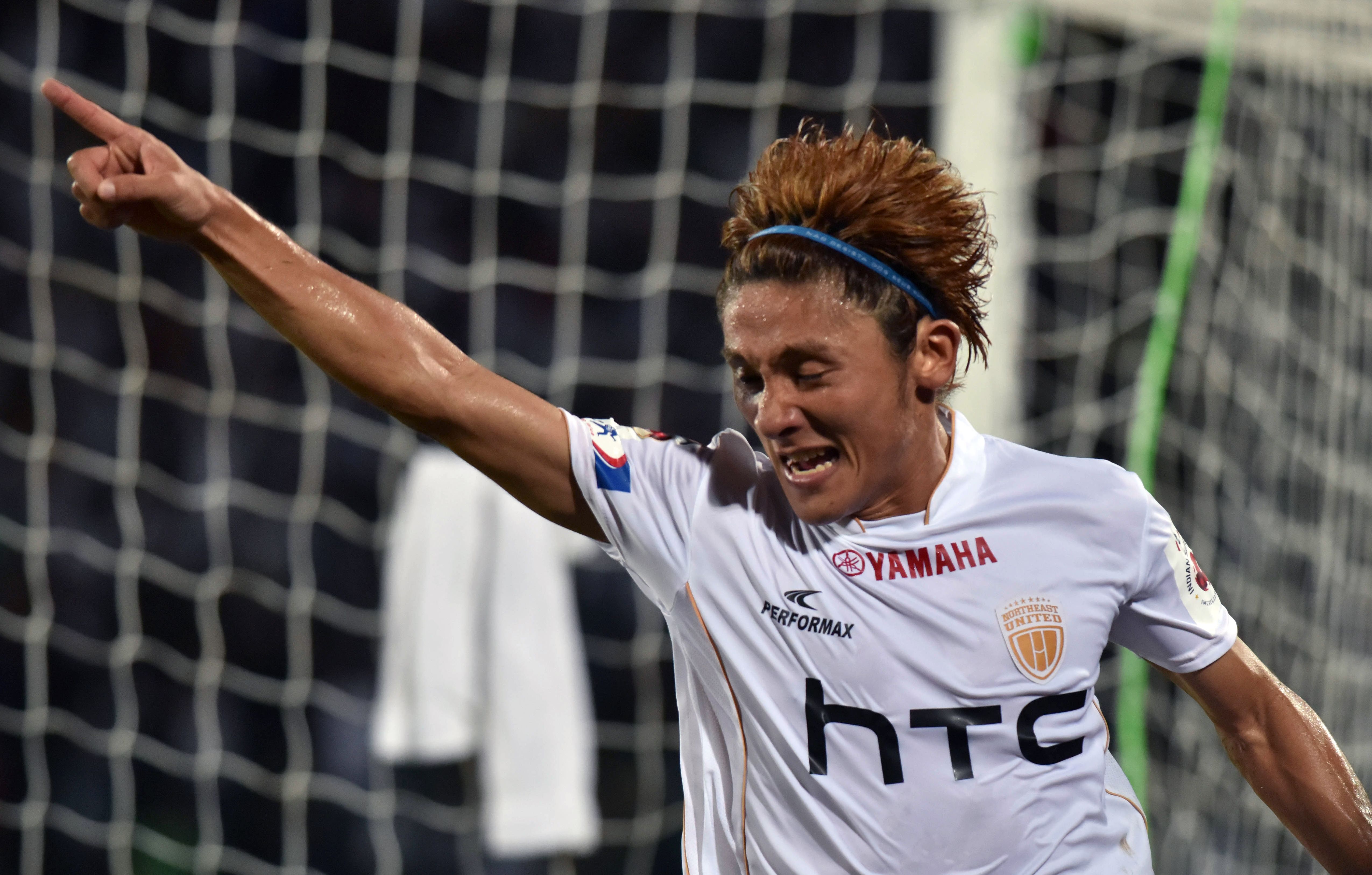 Northeast United FC's midfielder Katsumi Yusa celebrates after scoring a goal during the Indian Super League (ISL) football match between Northeast United FC and Kerala Blasters FC at The Indira Gandhi Athletic Stadium in Guwahati on October 1, 2016.
----IMAGE RESTRICTED TO EDITORIAL USE - STRICTLY NO COMMERCIAL USE-- / AFP / Biju BORO (Photo credit should read BIJU BORO/AFP/Getty Images)
