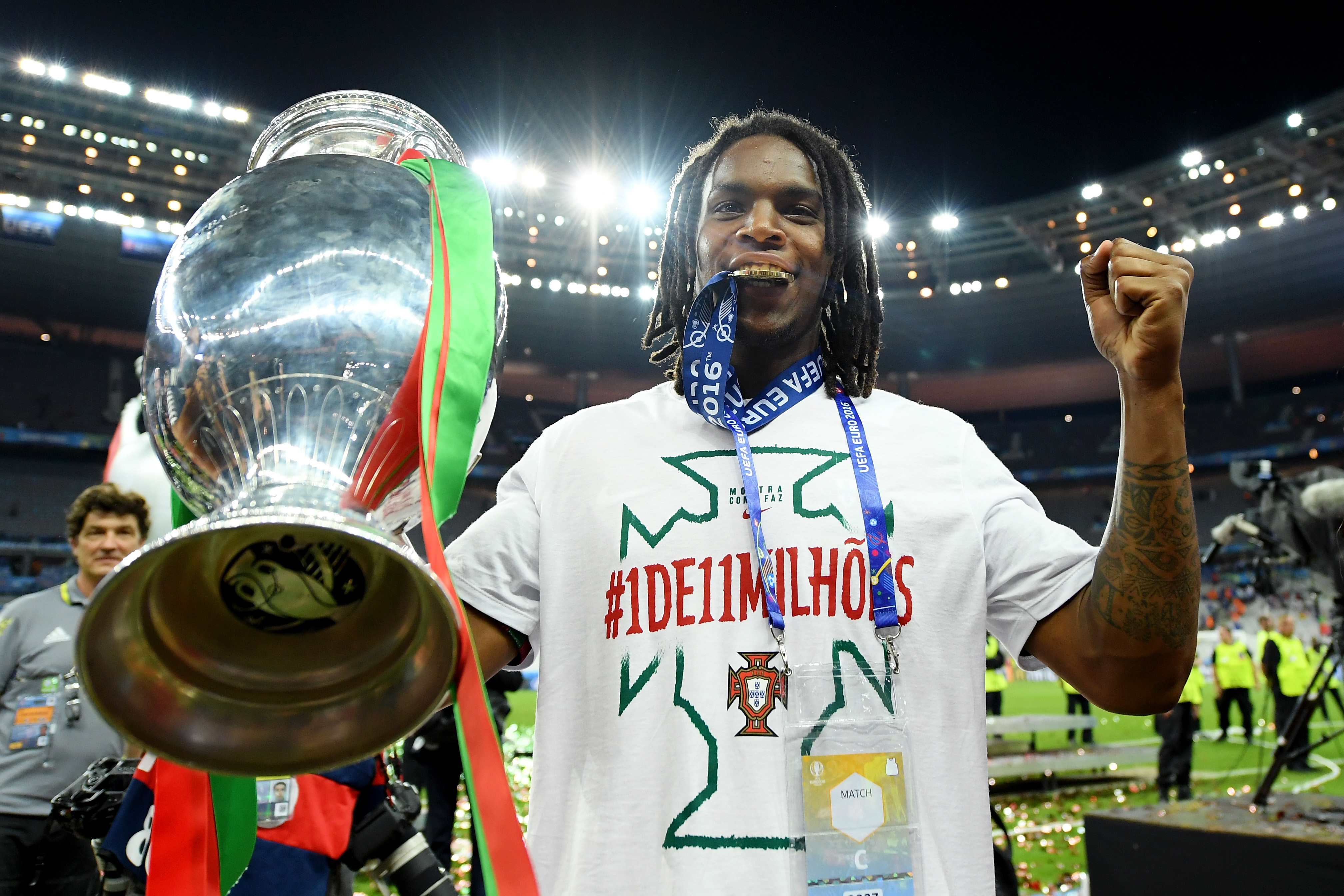 PARIS, FRANCE - JULY 10: Renato Sanches of Portugal holds the Henri Delaunay trophy to celebrate after his team's 1-0 win against France in the UEFA EURO 2016 Final match between Portugal and France at Stade de France on July 10, 2016 in Paris, France. (Photo by Matthias Hangst/Getty Images)