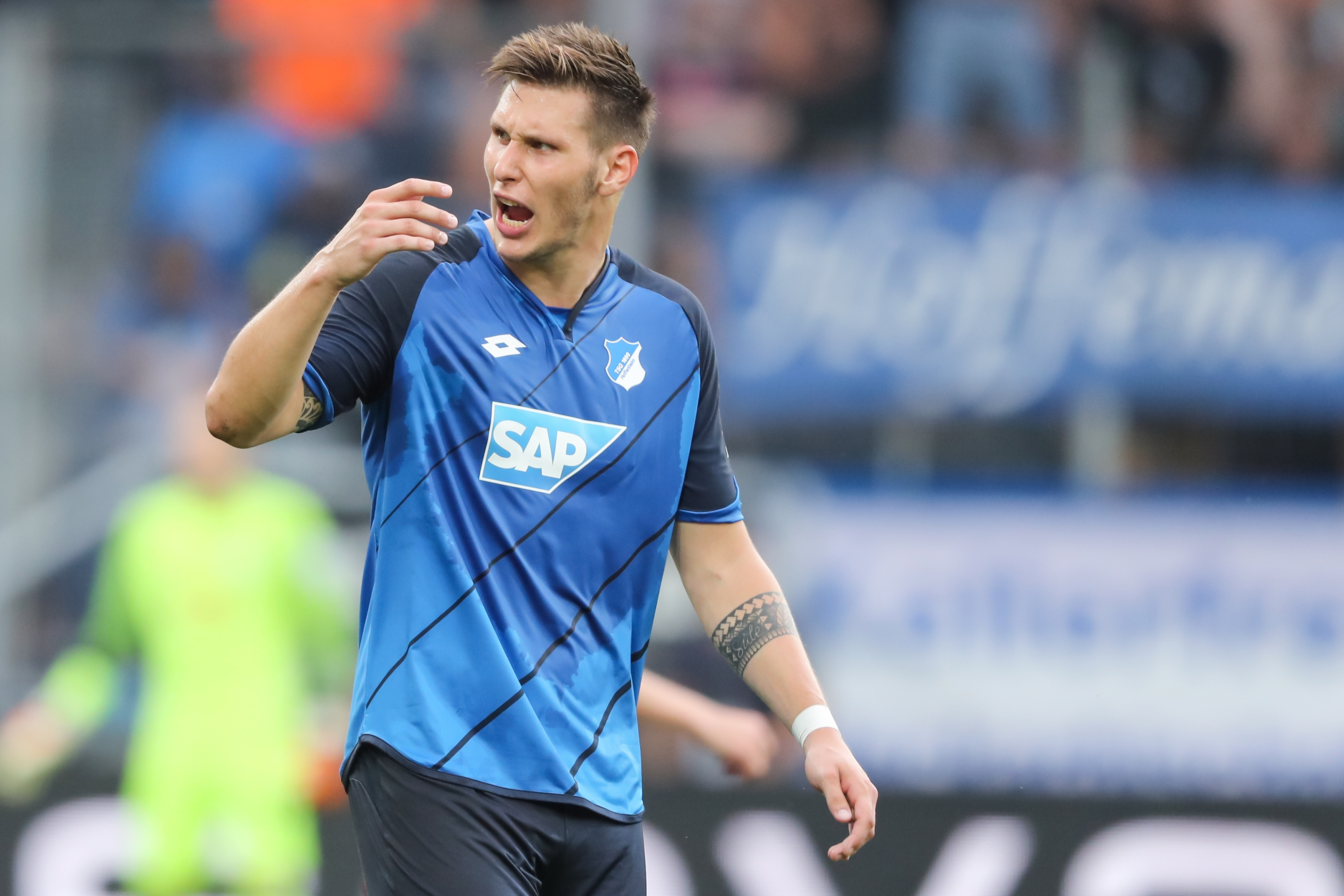 SINSHEIM, GERMANY - AUGUST 28:  Niklas Suele of Hoffenheim reacts during the Bundesliga match between TSG 1899 Hoffenheim and RB Leipzig at Wirsol Rhein-Neckar-Arena on August 28, 2016 in Sinsheim, Germany.  (Photo by Simon Hofmann/Bongarts/Getty Images)