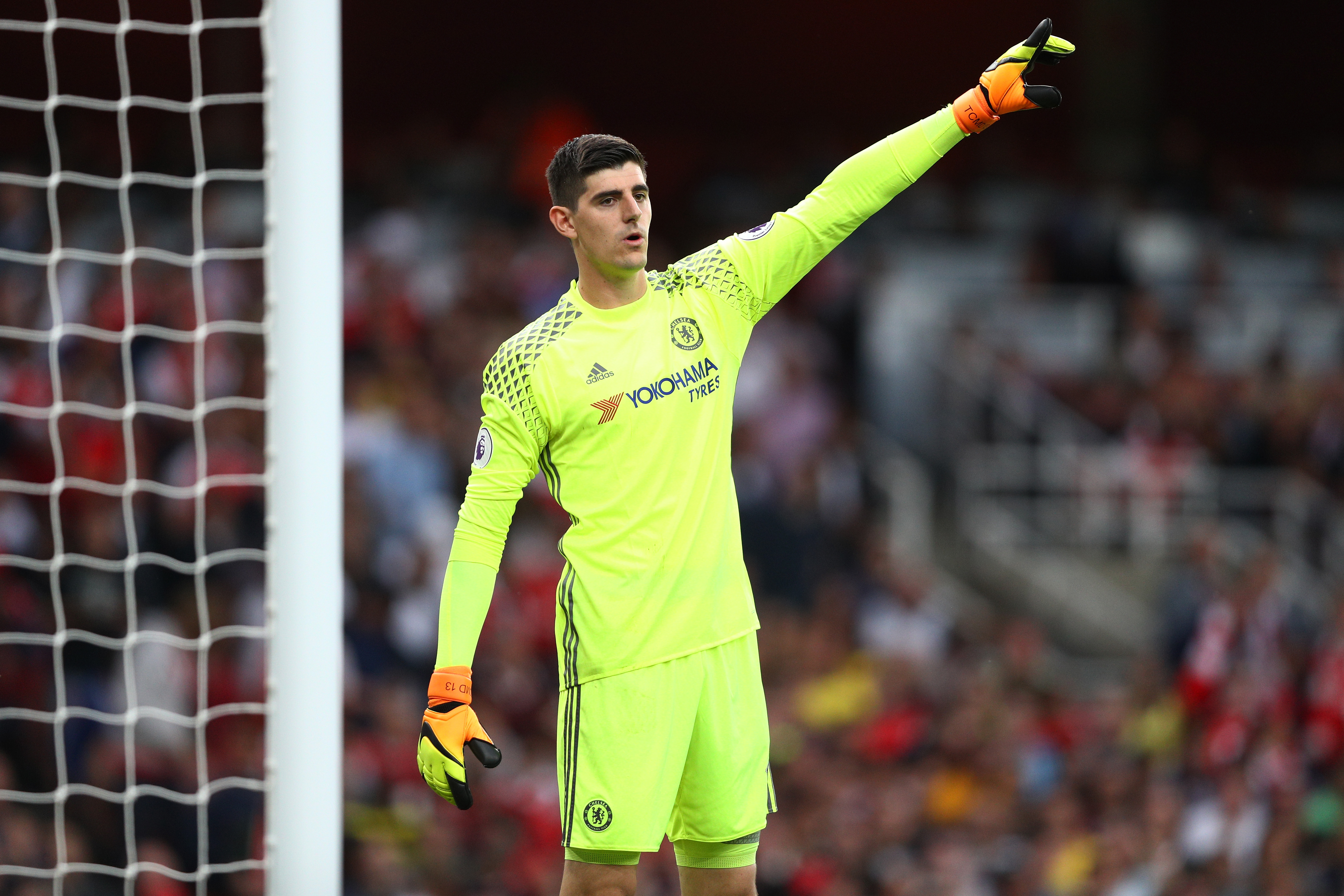 LONDON, ENGLAND - SEPTEMBER 24:  Thibaut Courtois of Chelsea signals during the Premier League match between Arsenal and Chelsea at the Emirates Stadium on September 24, 2016 in London, England.  (Photo by Paul Gilham/Getty Images)