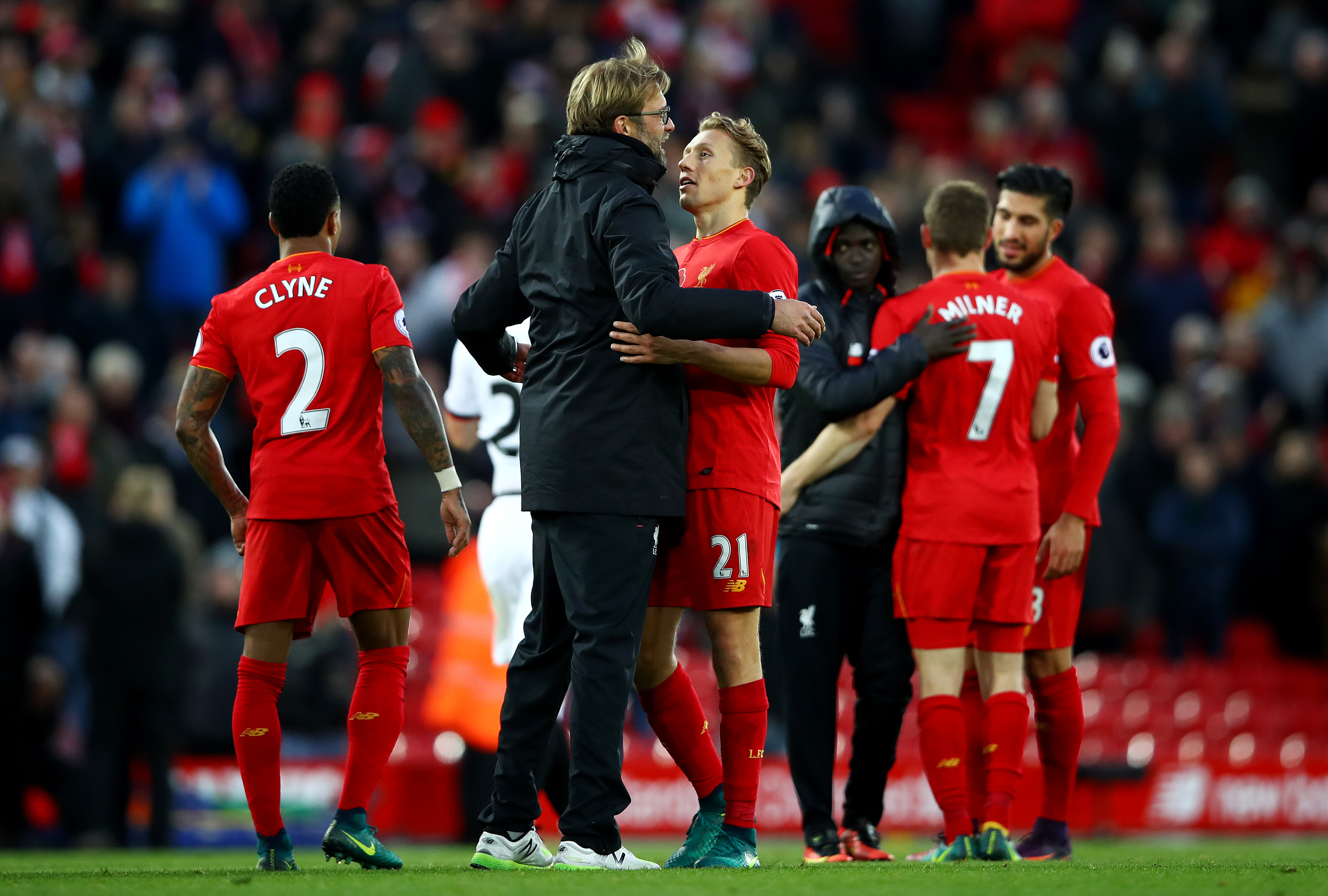 LIVERPOOL, ENGLAND - NOVEMBER 06:  Jurgen Klopp, Manager of Liverpool celebrates with Lucas Leiva of Liverpool during the Premier League match between Liverpool and Watford at Anfield on November 6, 2016 in Liverpool, England.  (Photo by Clive Brunskill/Getty Images)