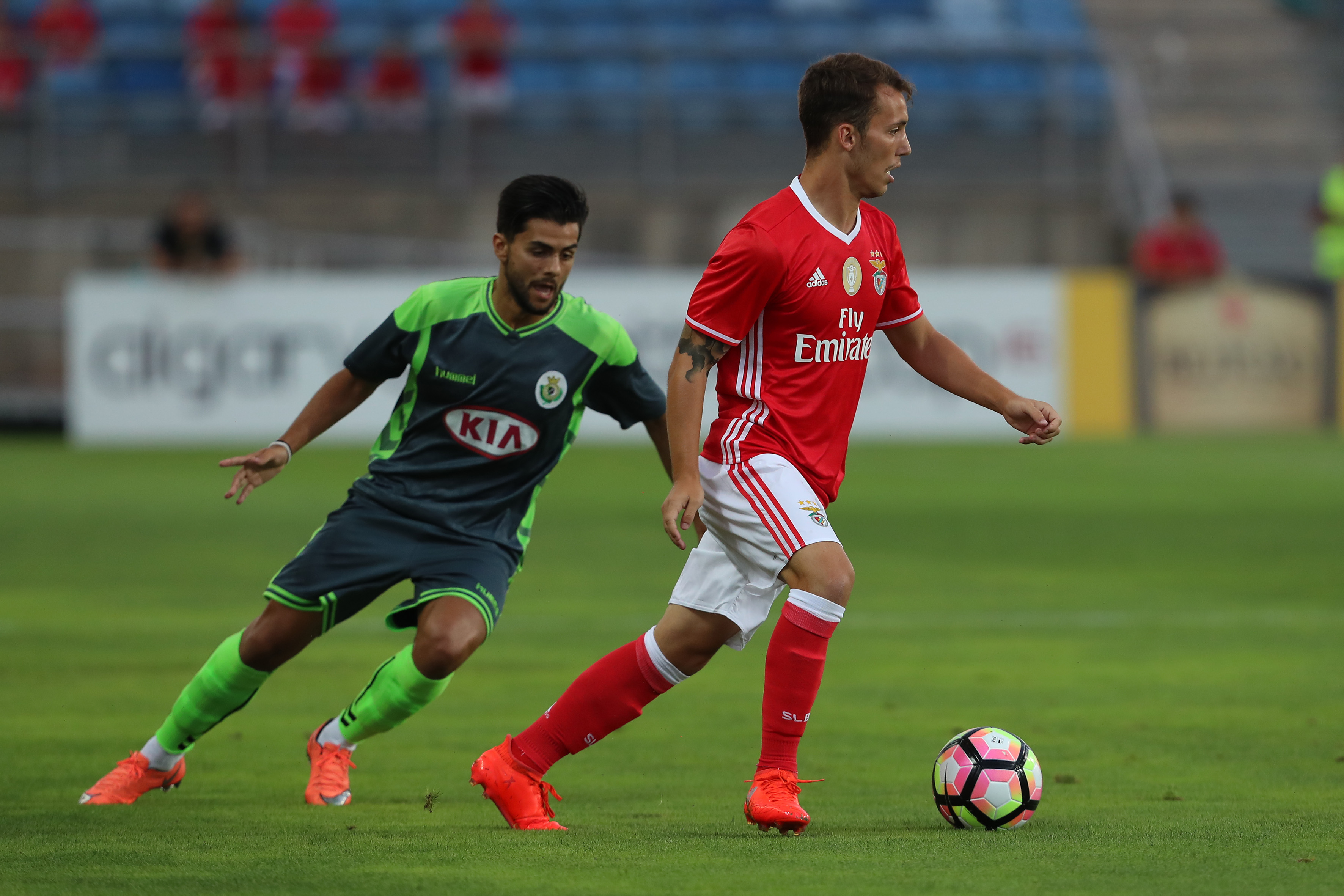 FARO, PORTUGAL - JULY 14:  Setubal's Midfielder Joao Amaral (L) vies Benfica's defender Alex Grimaldo (R) during the Pre Season match between SL Benfica and Vitoria Setubal at Estadio do Algarve on July 14, 2016 in Faro, Portugal.  (Photo by Carlos Rodrigues/Getty Images)