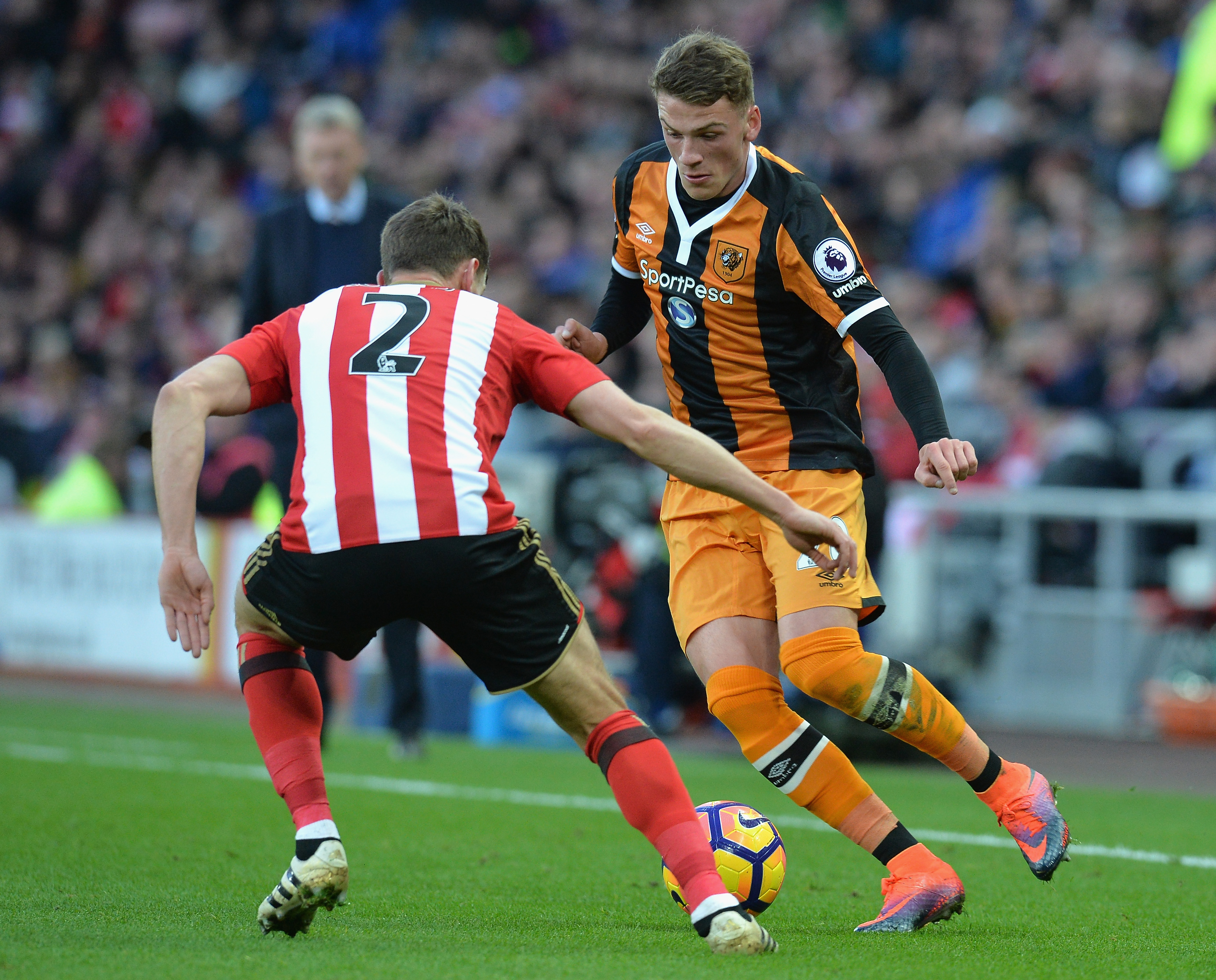 SUNDERLAND, ENGLAND - NOVEMBER 19: Josh Tymon of Hull City (R) takes on Billy Jones of Sunderland (L) during the Premier League match between Sunderland and Hull City at Stadium of Light on November 19, 2016 in Sunderland, England.  (Photo by Mark Runnacles/Getty Images)