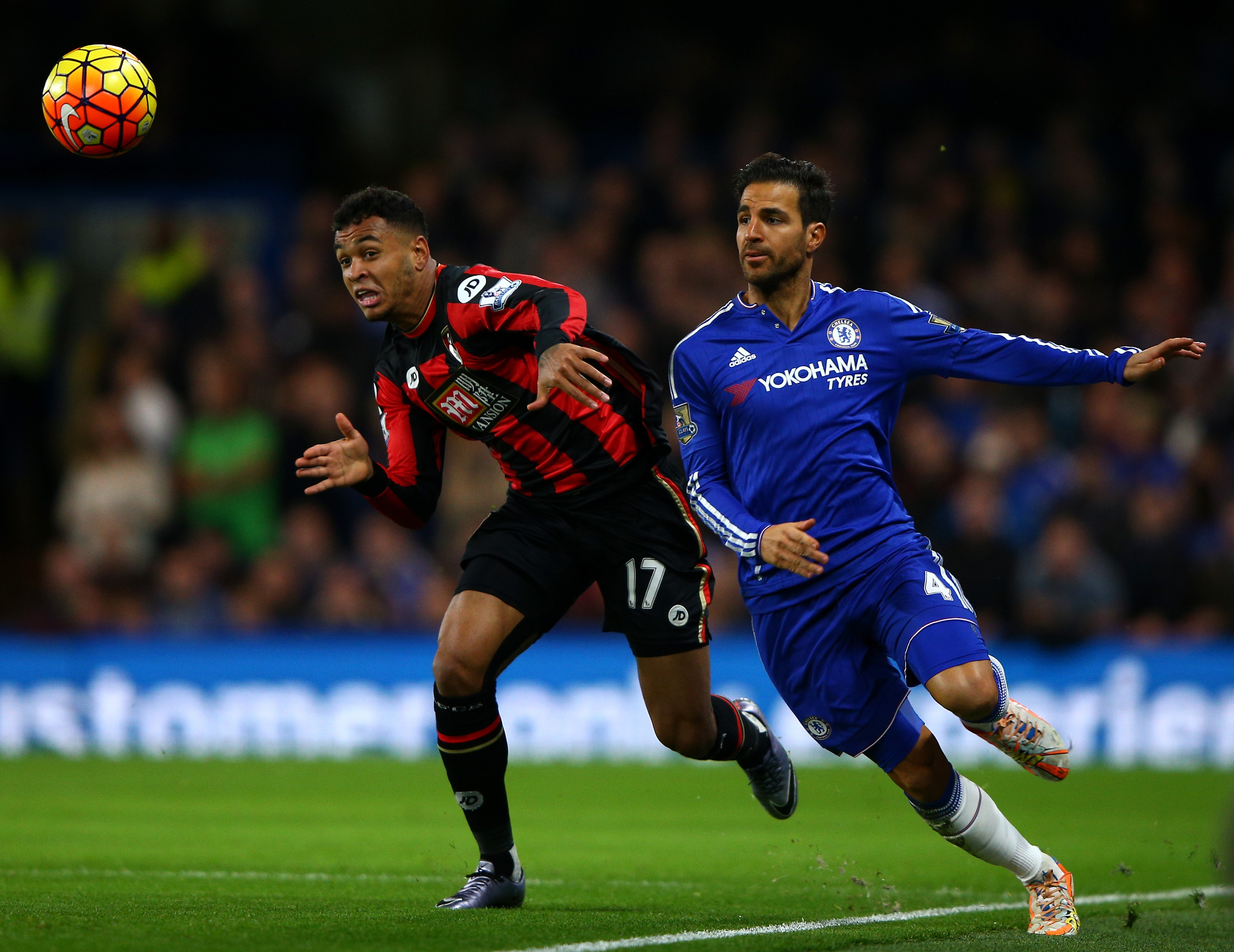 LONDON, ENGLAND - DECEMBER 05: Joshua King of Bournemouth and Cesc Fabregas of Chelsea compete for the ball during the Barclays Premier League match between Chelsea and A.F.C. Bournemouth at Stamford Bridge on December 5, 2015 in London, England. (Photo by Ian Walton/Getty Images)
