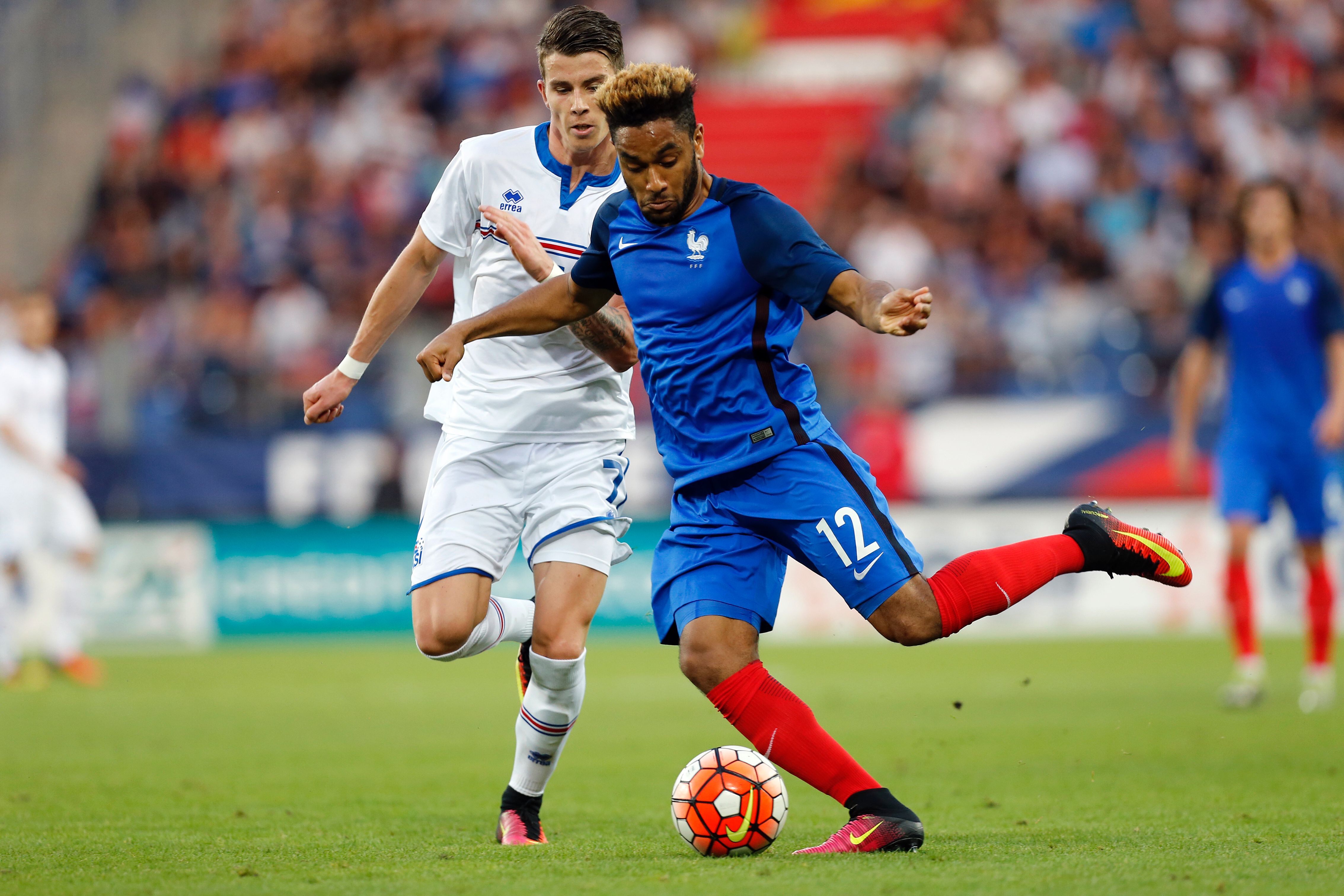 France's Jordan Amavi (R) vies for the ball with Iceland's Vioar Ari Jonsson (L) during the Under-21 2017 European Championship qualifier football match France vs Iceland, on September 6, 2016 at the Michel d'Ornano stadium, in Caen, northwestern France. / AFP / CHARLY TRIBALLEAU (Photo credit should read CHARLY TRIBALLEAU/AFP/Getty Images)