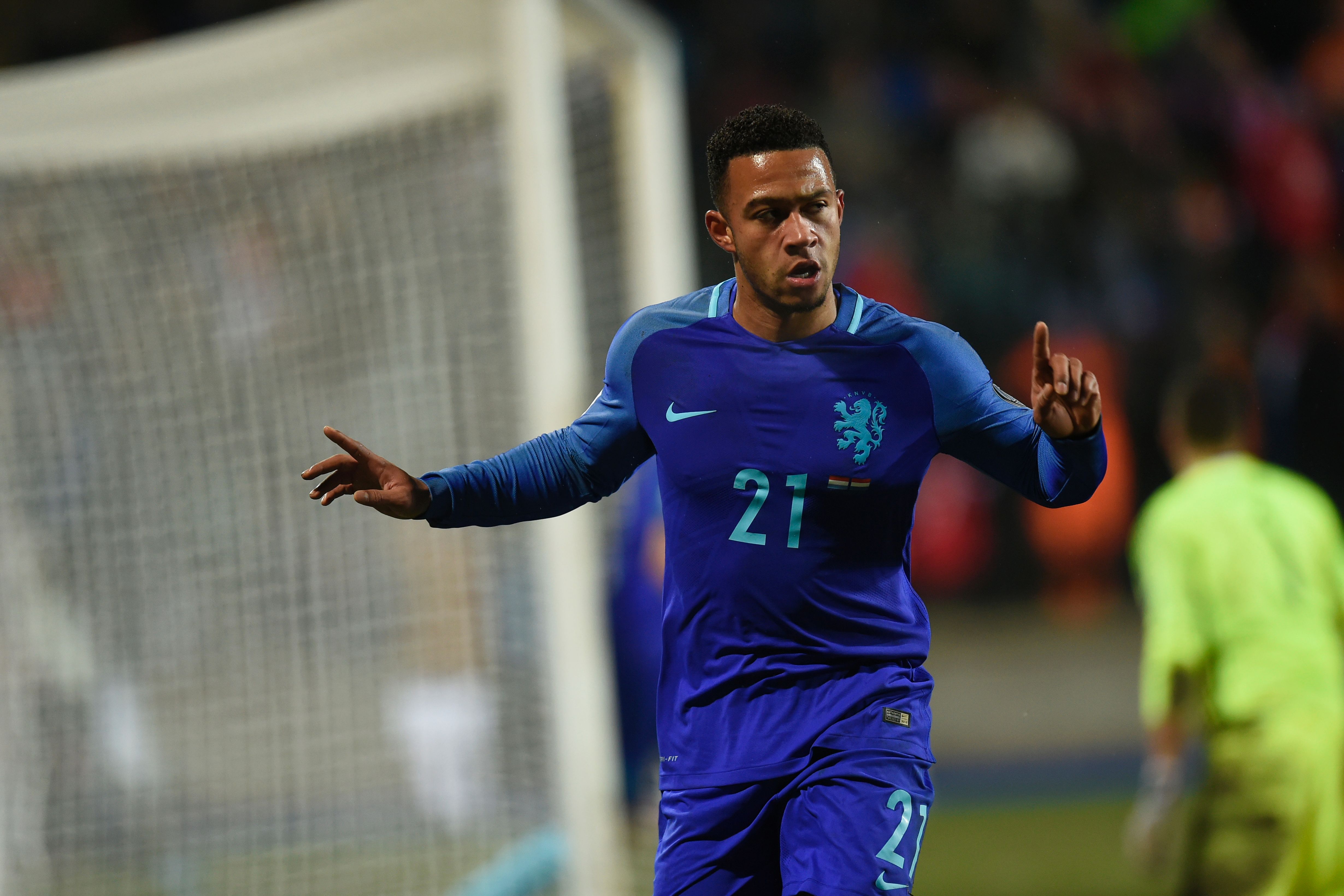 Netherlands' Memphis Depay celebrates after scoring a goal during the World Cup 2018 qualifying match between Luxembourg and Netherlands on November 13, 2016 at the Josy Barthel Stadium in Luxembourg. (Photo credit: John Thys/AFP/Getty Images)