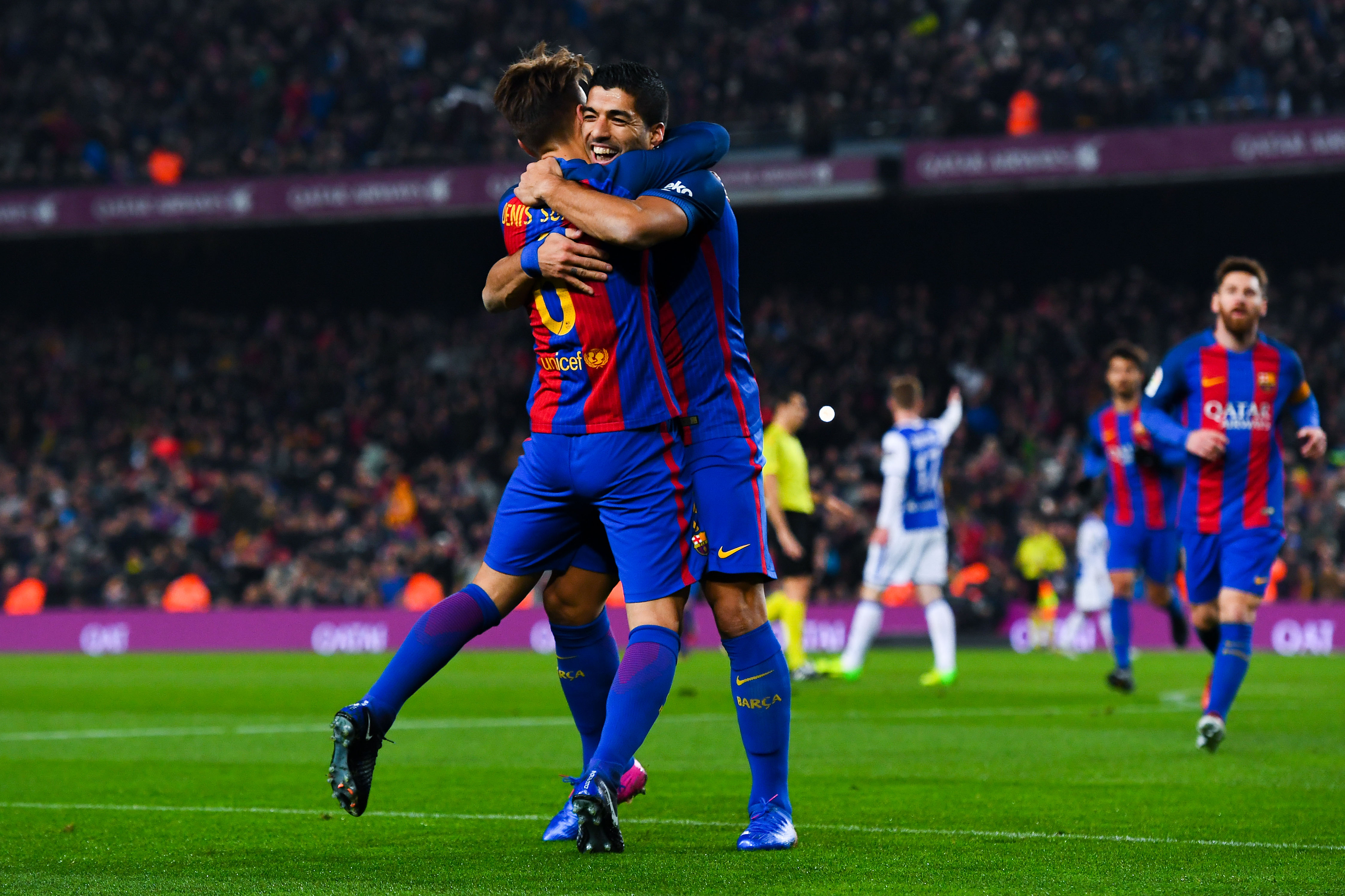 BARCELONA, SPAIN - JANUARY 26:  Denis Suarez of FC Barcelona celebrates with his team mate Luis Suarez after scoring his team's first goal during the Copa del Rey quarter-final second leg match between FC Barcelona and Real Sociedad at Camp Nou on January 26, 2017 in Barcelona, Spain.  (Photo by David Ramos/Getty Images)