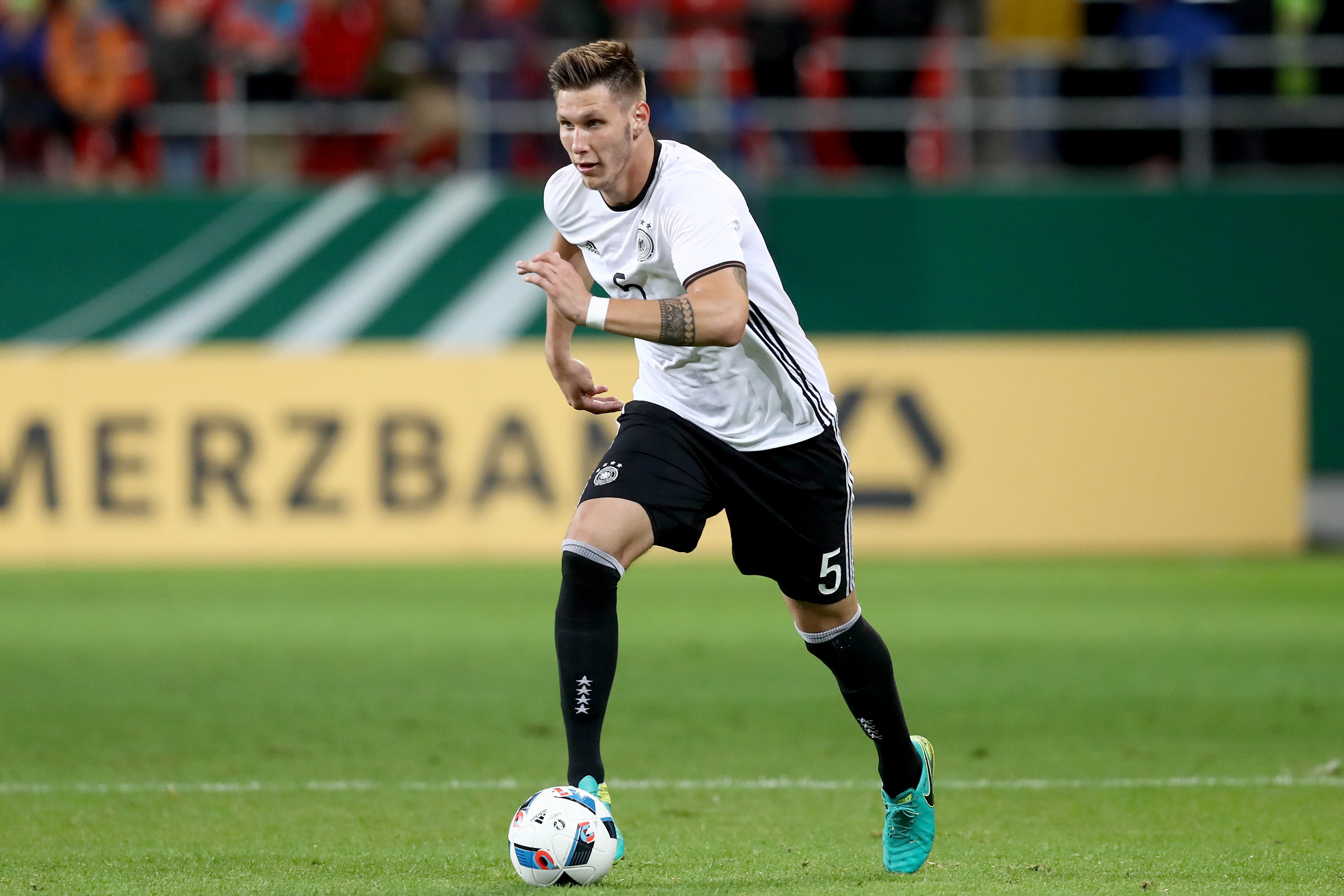 INGOLSTADT, GERMANY - OCTOBER 07: Niklas Suele of Germany runs with the ball during the 2017 UEFA European U21 Championships Qualifier between Germany and Russia at Audi Sportpark on October 7, 2016 in Ingolstadt, Germany. (Photo by Alexander Hassenstein/Bongarts/Getty Images)