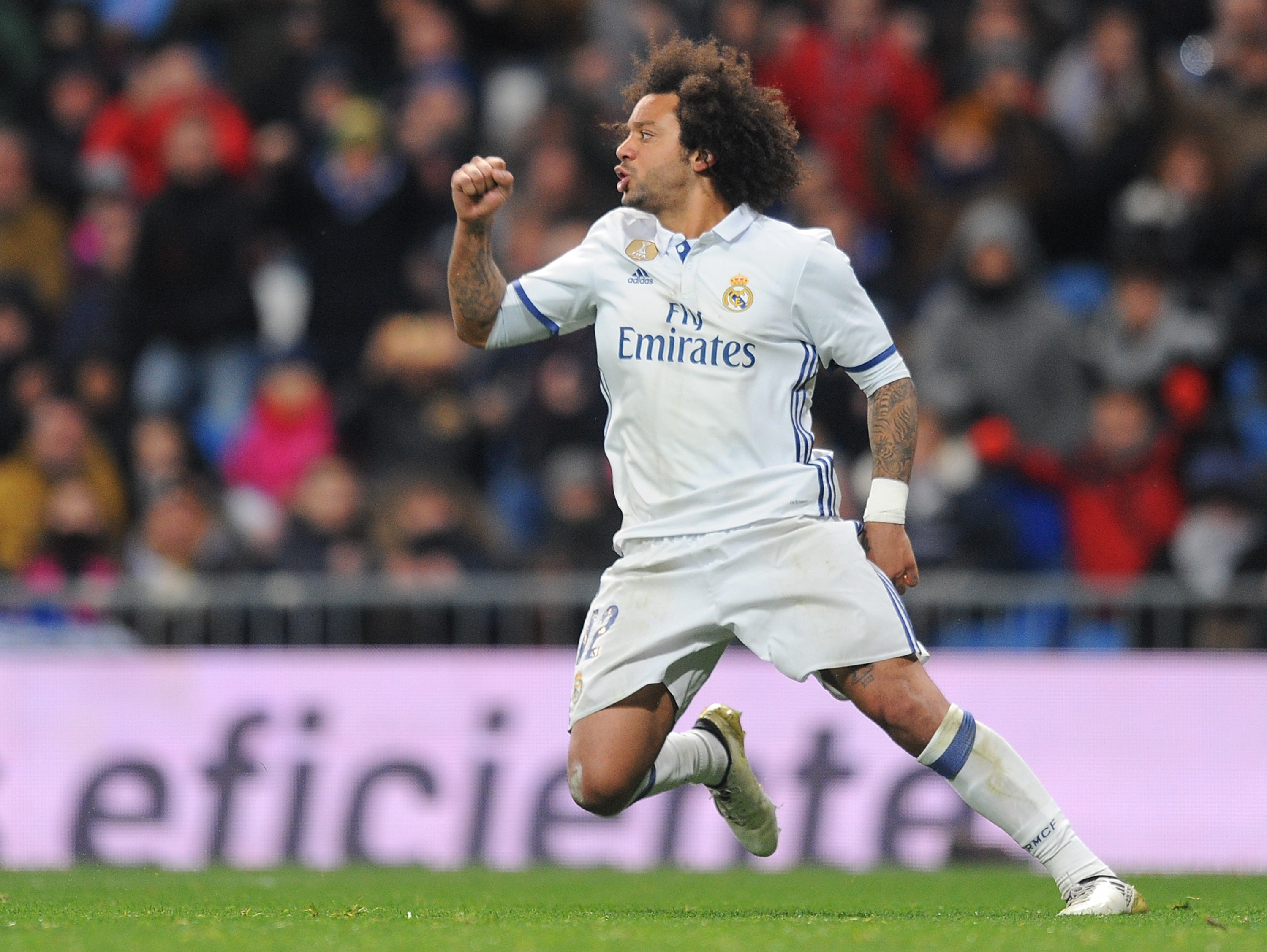 MADRID, SPAIN - JANUARY 18:  Marcelo of Real Madrid reacts after scoring his team's first goal during the Copa del Rey Quarter Final, First Leg match between Real Madrid CF and  Celta Vigo at Bernabeu on January 18, 2017 in Madrid, Spain.  (Photo by Denis Doyle/Getty Images)