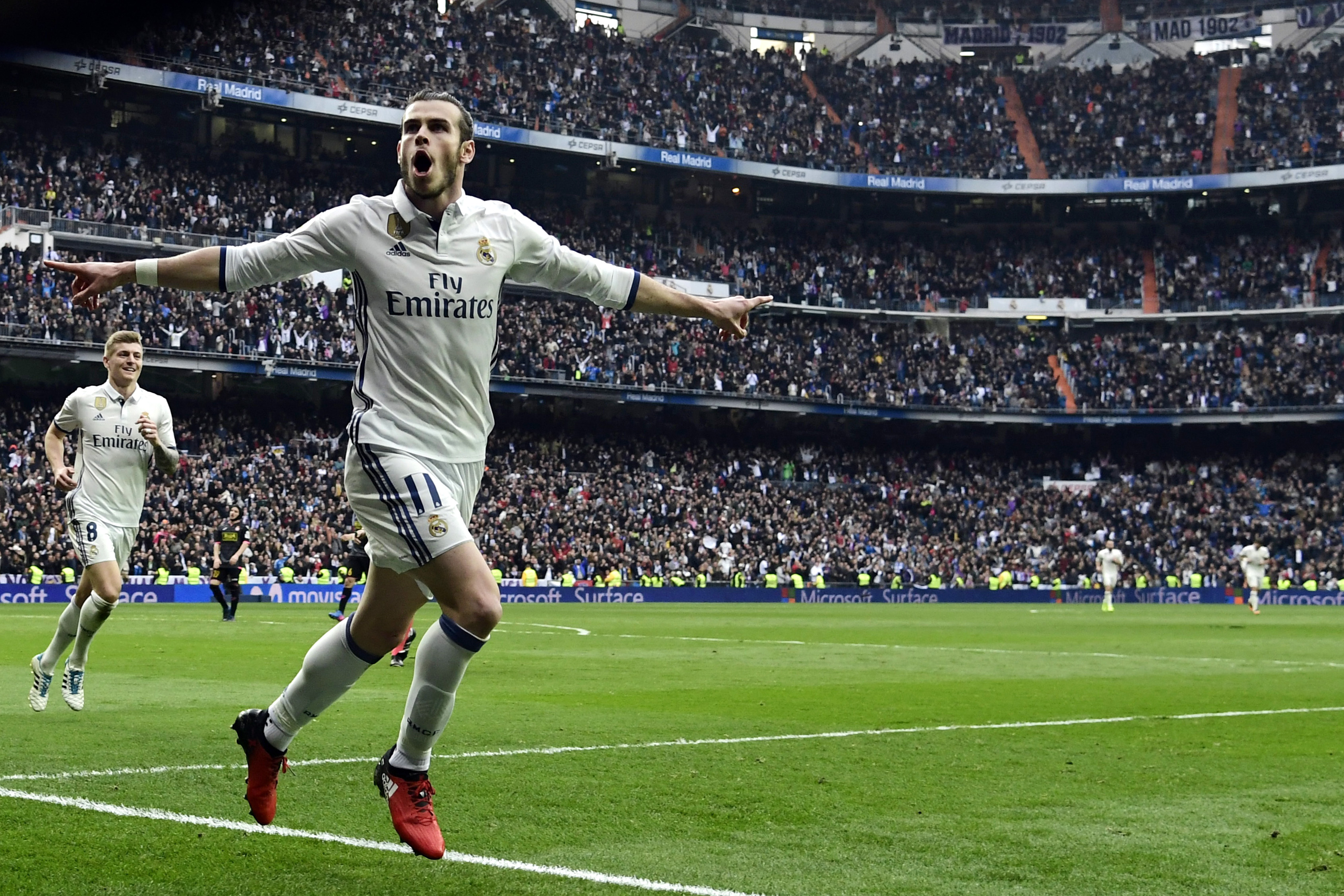 Real Madrid's Welsh forward Gareth Bale celebrates a goal during the Spanish league football match Real Madrid CF vs RCD Espanyol at the Santiago Bernabeu stadium in Madrid on February 18, 2017. / AFP / JAVIER SORIANO (Photo credit should read JAVIER SORIANO/AFP/Getty Images)