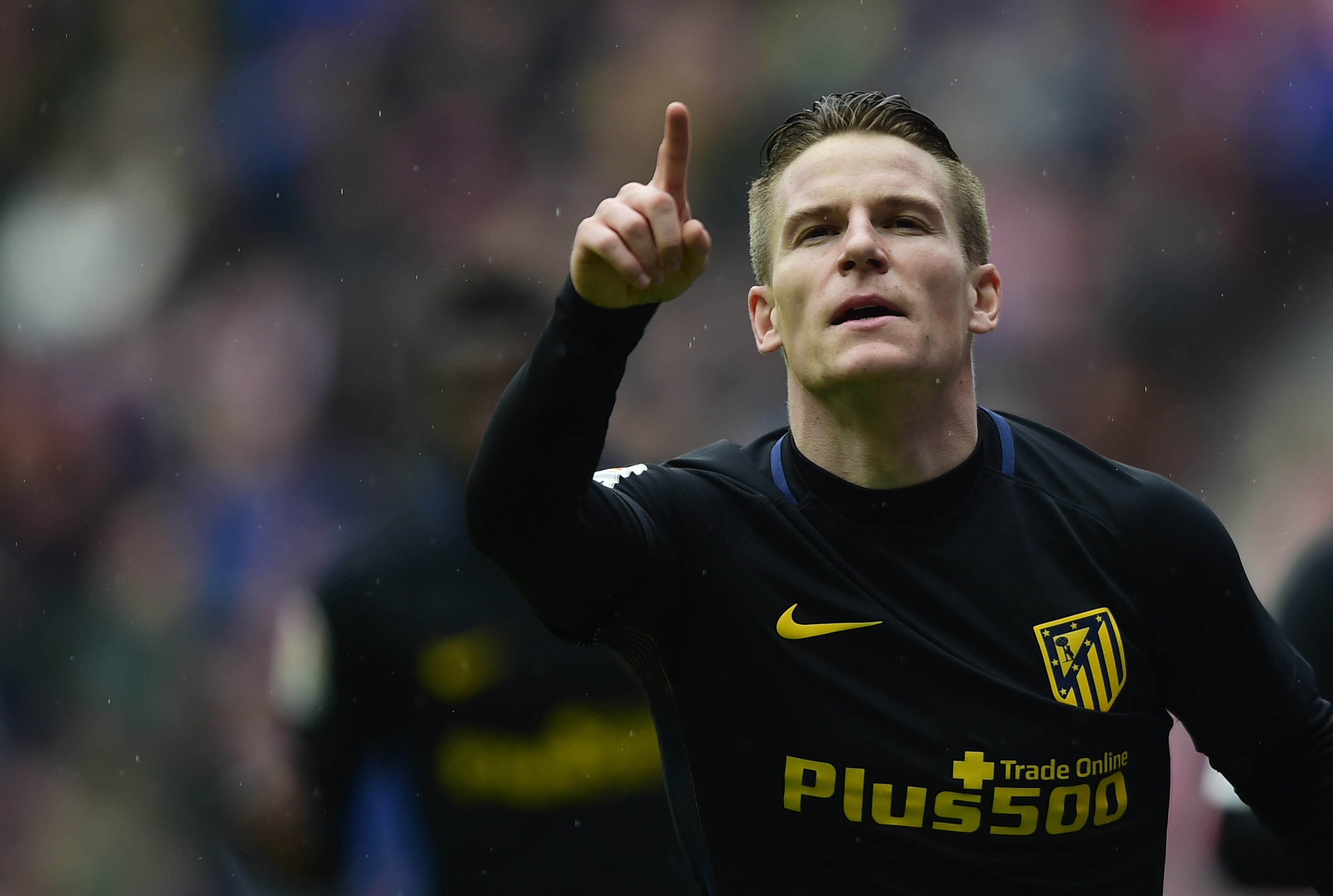 Atletico Madrid's French forward Kevin Gameiro celebrates a goal during the Spanish league football match Real Sporting de Gijon vs Club Atletico de Madrid at El Molinon stadium in Gijon on February 18, 2017. / AFP / MIGUEL RIOPA (Photo credit should read MIGUEL RIOPA/AFP/Getty Images)