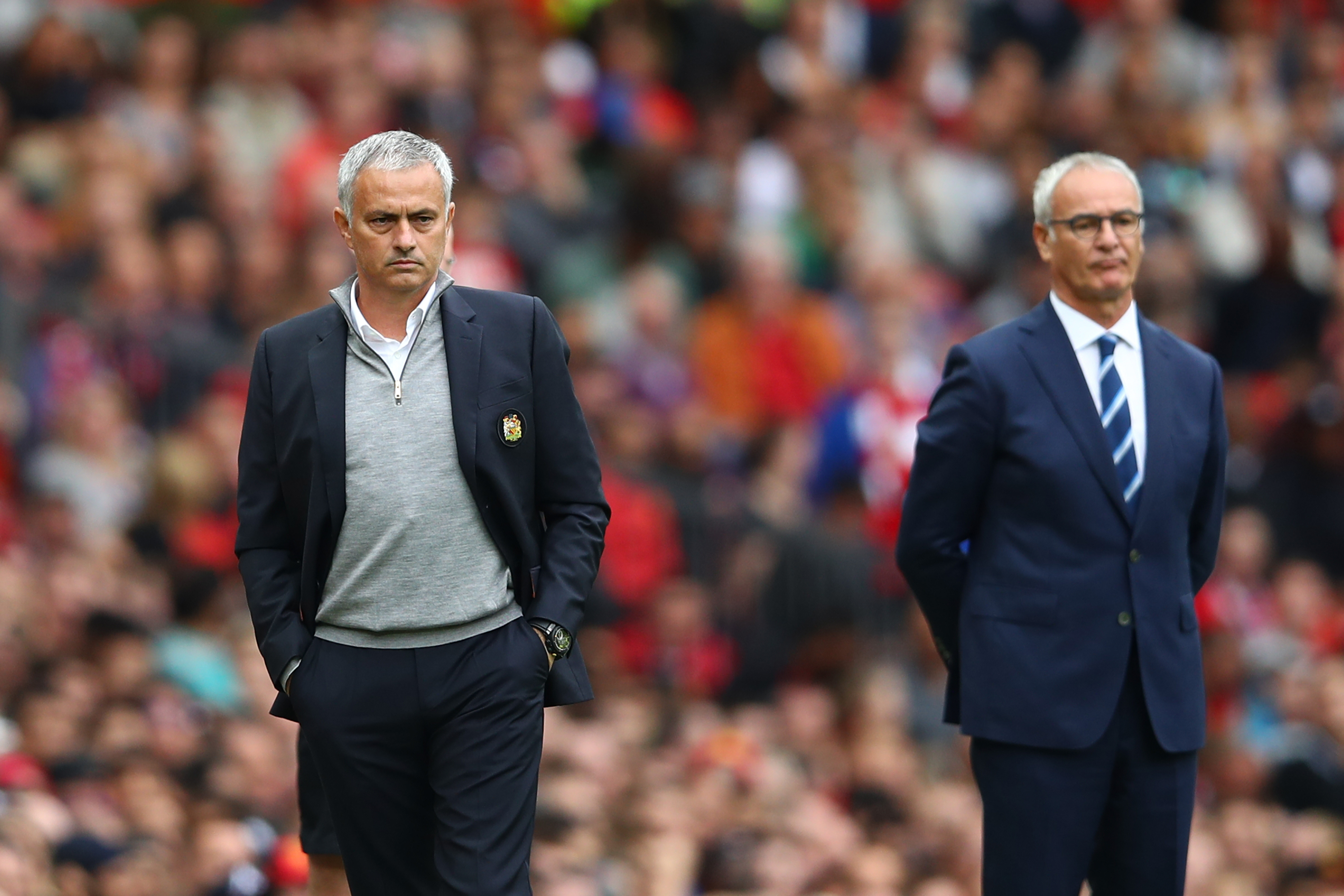 MANCHESTER, ENGLAND - SEPTEMBER 24: Jose Mourinho, Manager of Manchester United (L) and Claudio Ranieri, Manager of Leicester City (R) look on during the Premier League match between Manchester United and Leicester City at Old Trafford on September 24, 2016 in Manchester, England. (Photo by Clive Brunskill/Getty Images)