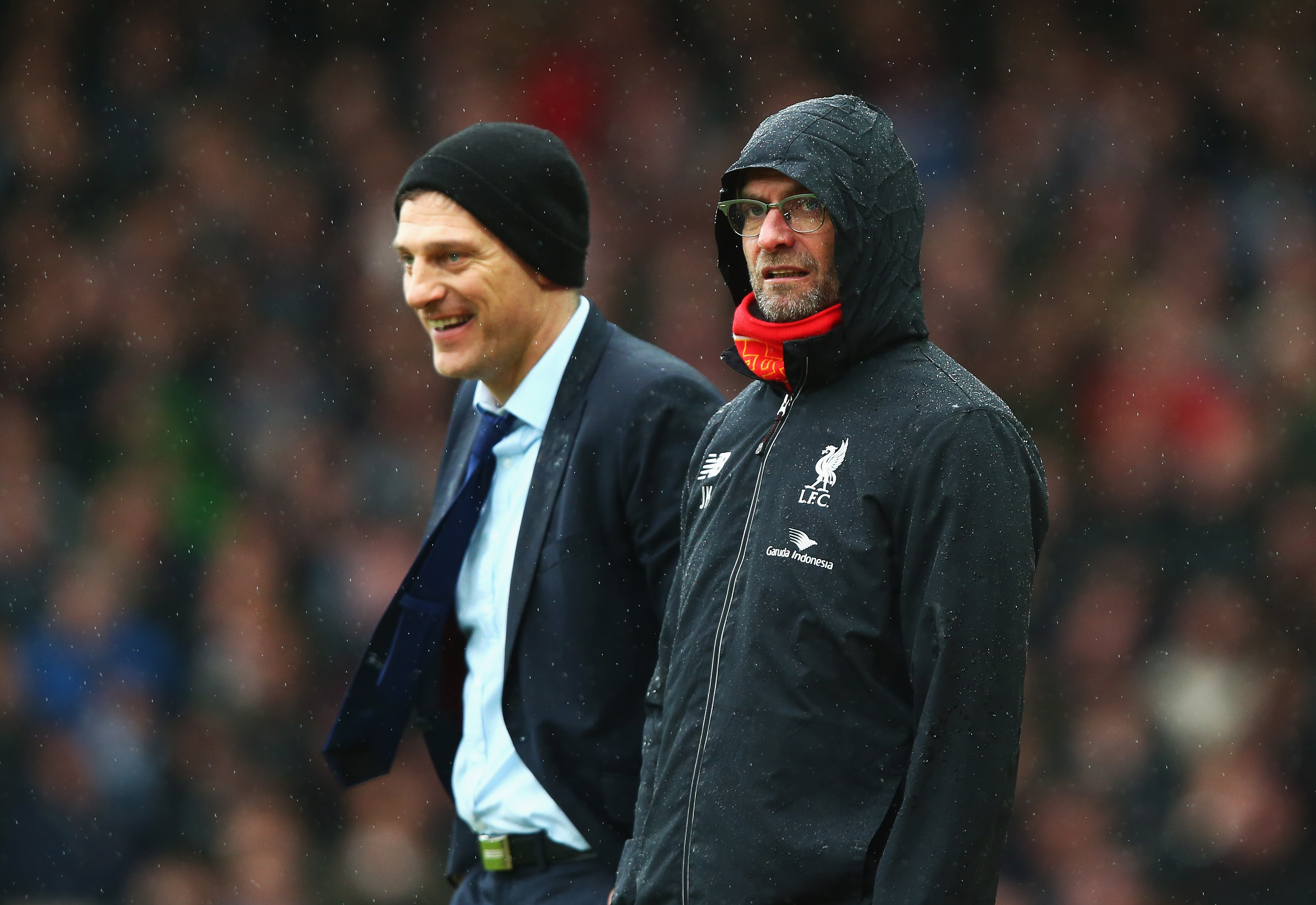 LONDON, ENGLAND - JANUARY 02: Slaven Bilic (L) manager of West Ham United and Jurgen Klopp (R) manager of Liverpool are seen during the Barclays Premier League match between West Ham United and Liverpool at Boleyn Ground on January 2, 2016 in London, England.  (Photo by Clive Rose/Getty Images)