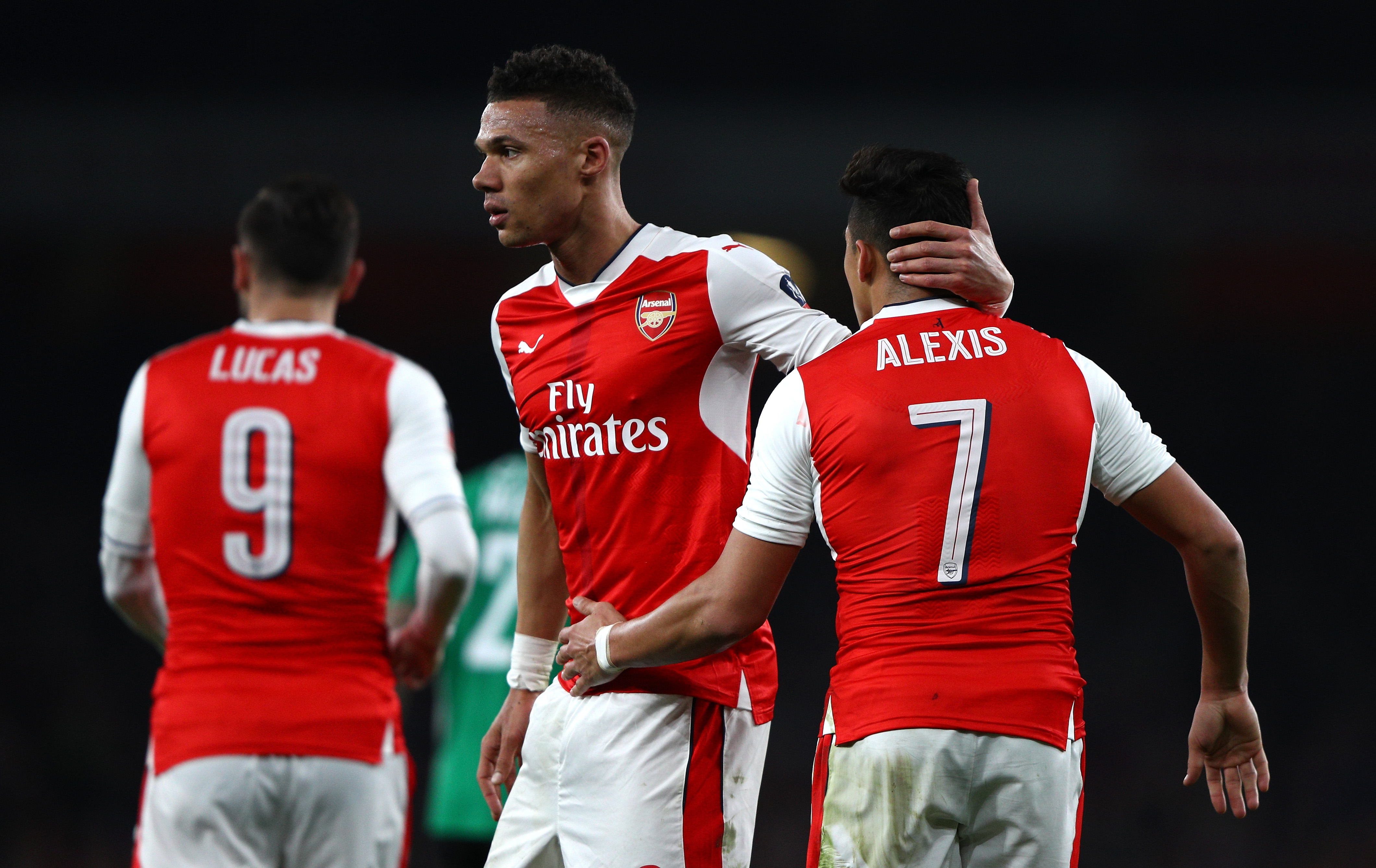 LONDON, ENGLAND - MARCH 11: Alexis Sanchez of Arsenal (R) celebrates scoring his sides fourth goal with Kieran Gibbs of Arsenal (C) during The Emirates FA Cup Quarter-Final match between Arsenal and Lincoln City at Emirates Stadium on March 11, 2017 in London, England. (Photo by Ian Walton/Getty Images)