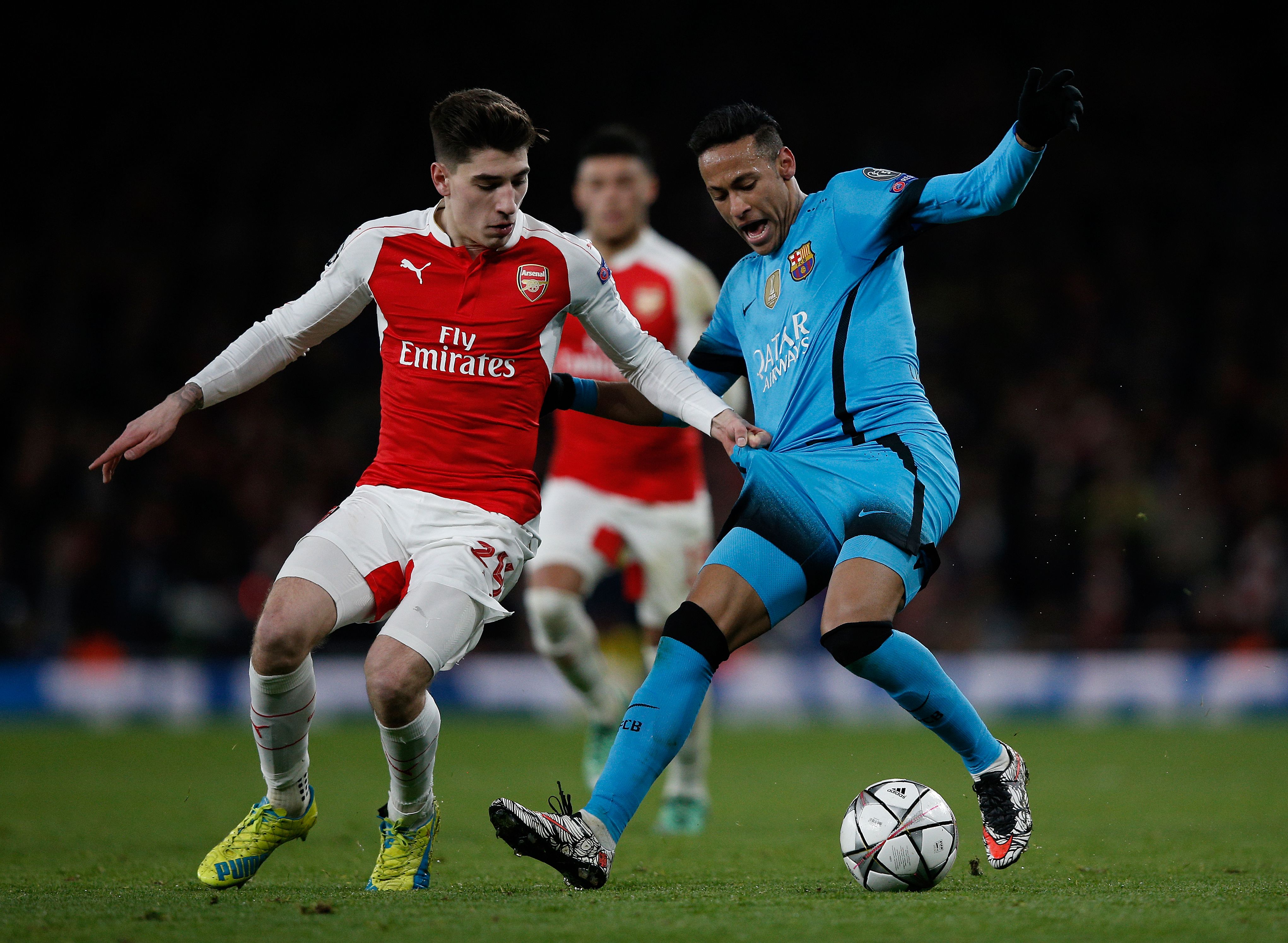 Arsenal's Spanish defender Hector Bellerin (L) vies with Barcelona's Brazilian forward Neymar during the UEFA Champions League round of 16 1st leg football match between Arsenal and Barcelona at the Emirates Stadium in London on February 23, 2016.
/ AFP / ADRIAN DENNIS (Photo credit should read ADRIAN DENNIS/AFP/Getty Images)
