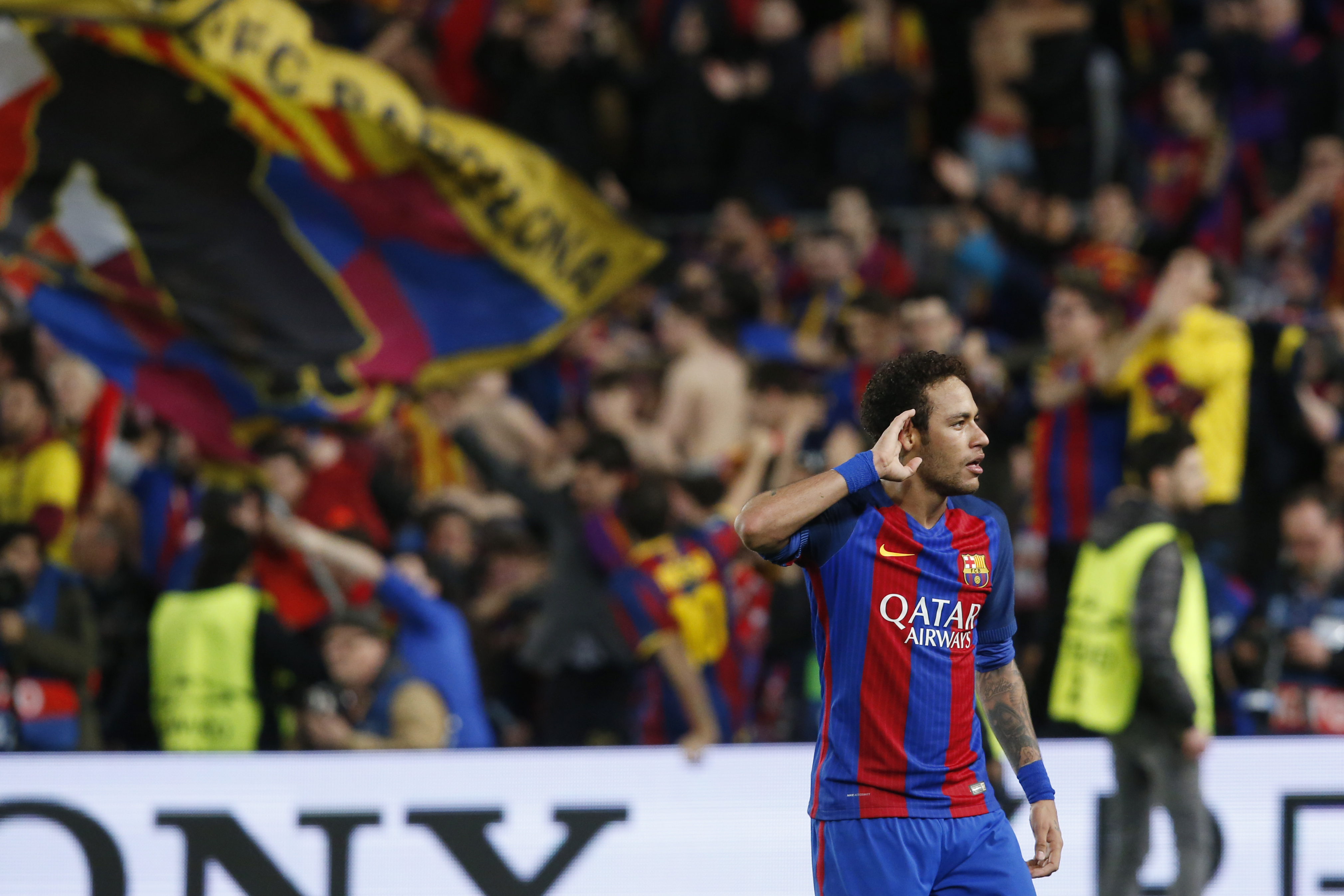 Barcelona's Brazilian forward Neymar celebrates at the end of the UEFA Champions League round of 16 second leg football match FC Barcelona vs Paris Saint-Germain FC at the Camp Nou stadium in Barcelona on March 8, 2017. / AFP PHOTO / PAU BARRENA (Photo credit should read PAU BARRENA/AFP/Getty Images)