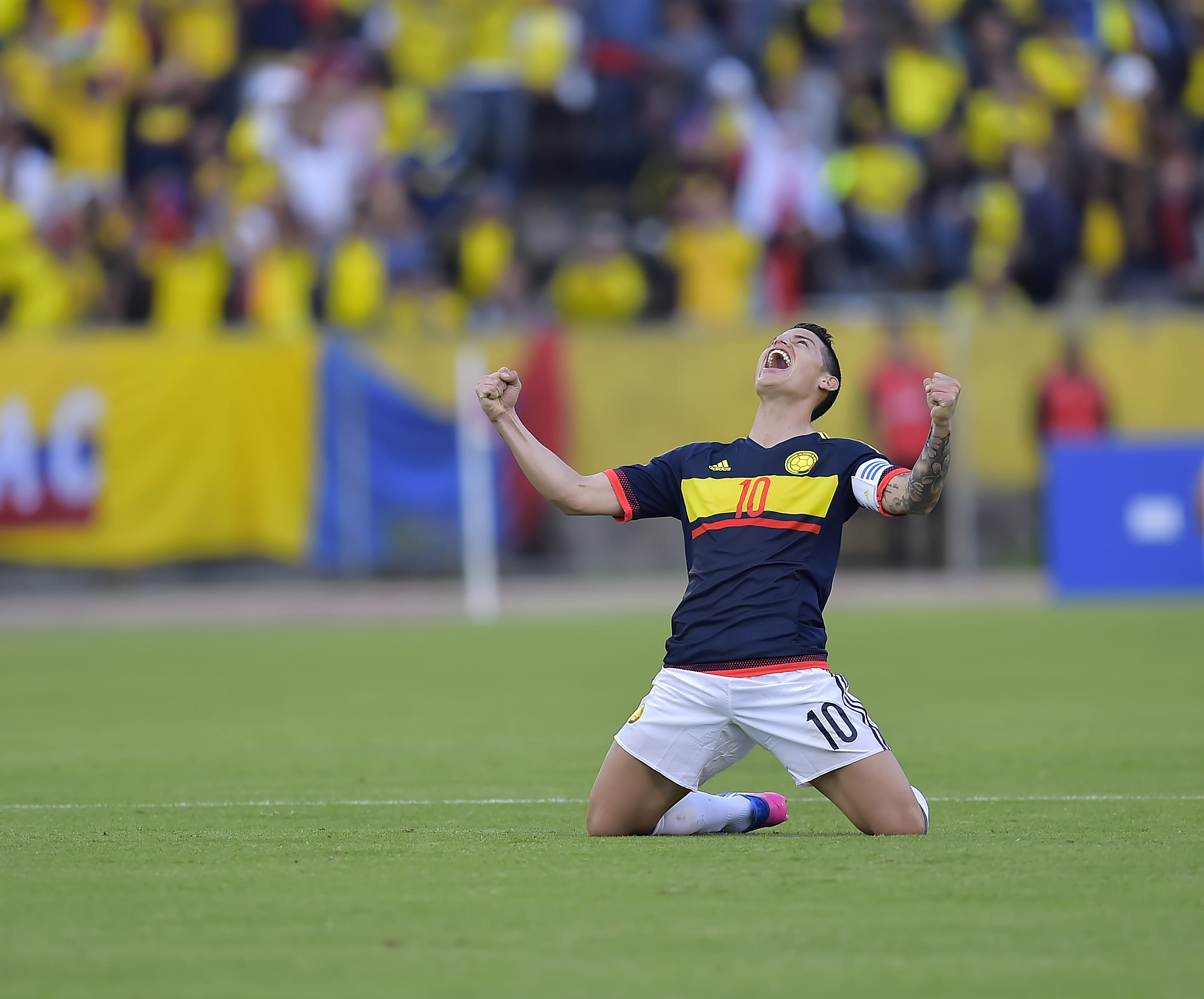 Colombia's midfielder James Rodriguez celebrates after winning 2-0 their 2018 FIFA World Cup qualifier football match against Ecuador in Quito on March 28, 2017. / AFP PHOTO / Rodrigo BUENDIA (Photo credit should read RODRIGO BUENDIA/AFP/Getty Images)