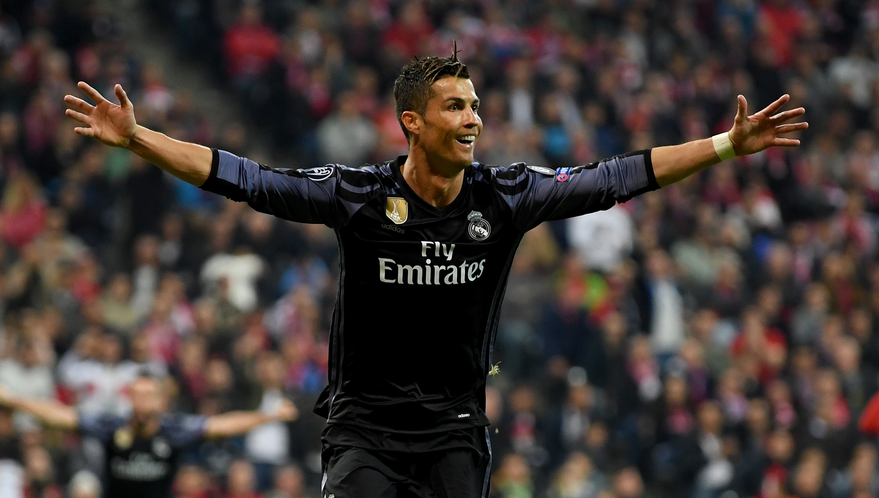 MUNICH, GERMANY - APRIL 12:  Cristiano Ronaldo #7 of Real Madrid celebrates after he scores his team's 2nd goal during the UEFA Champions League Quarter Final first leg match between FC Bayern Muenchen and Real Madrid CF at Allianz Arena on April 12, 2017 in Munich, Germany.  (Photo by Matthias Hangst/Bongarts/Getty Images)