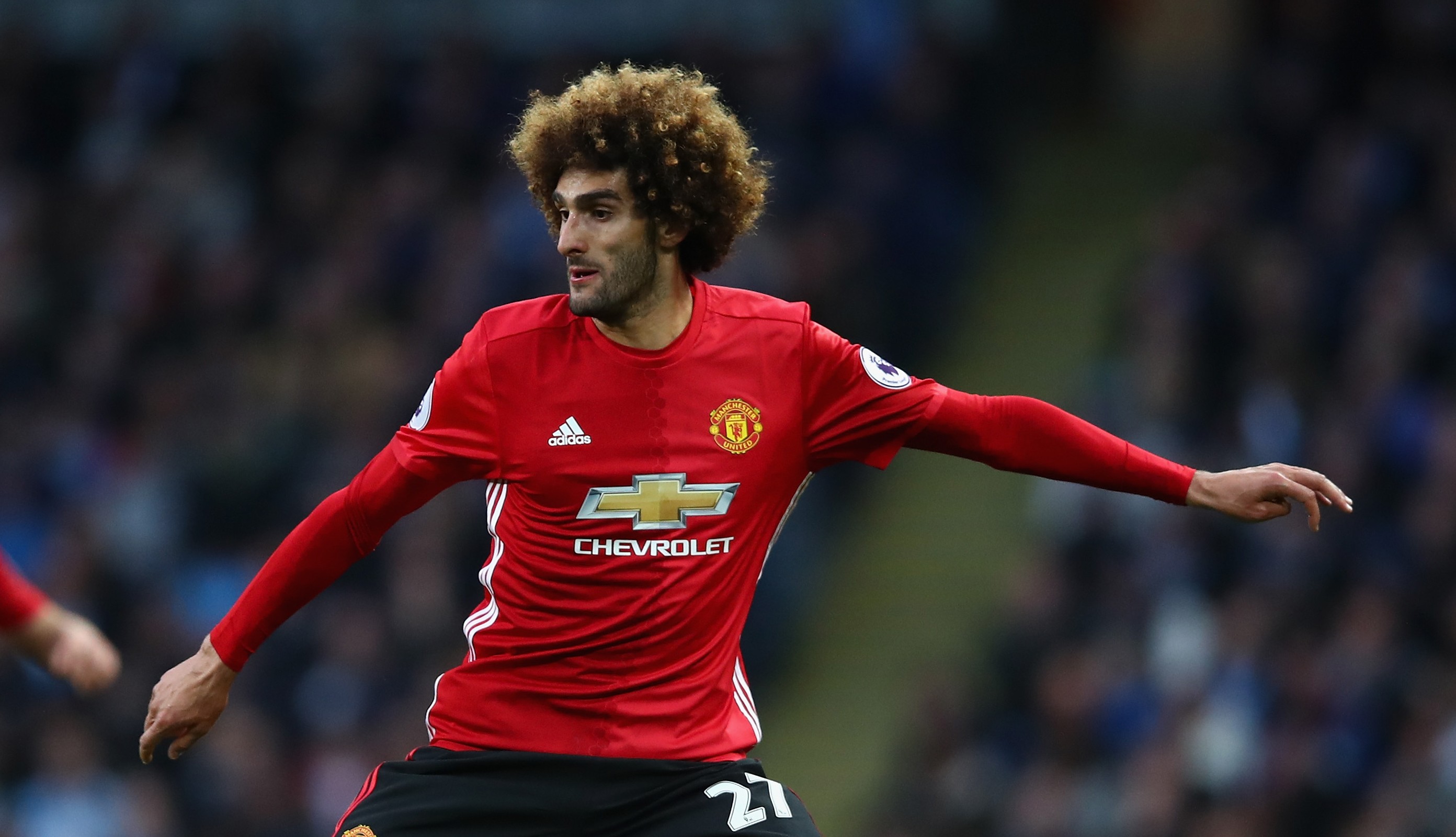 MANCHESTER, ENGLAND - APRIL 27:  Marouane Fellaini of Manchester United in action during the Premier League match between Manchester City and Manchester United at Etihad Stadium on April 27, 2017 in Manchester, England.  (Photo by Clive Brunskill/Getty Images)