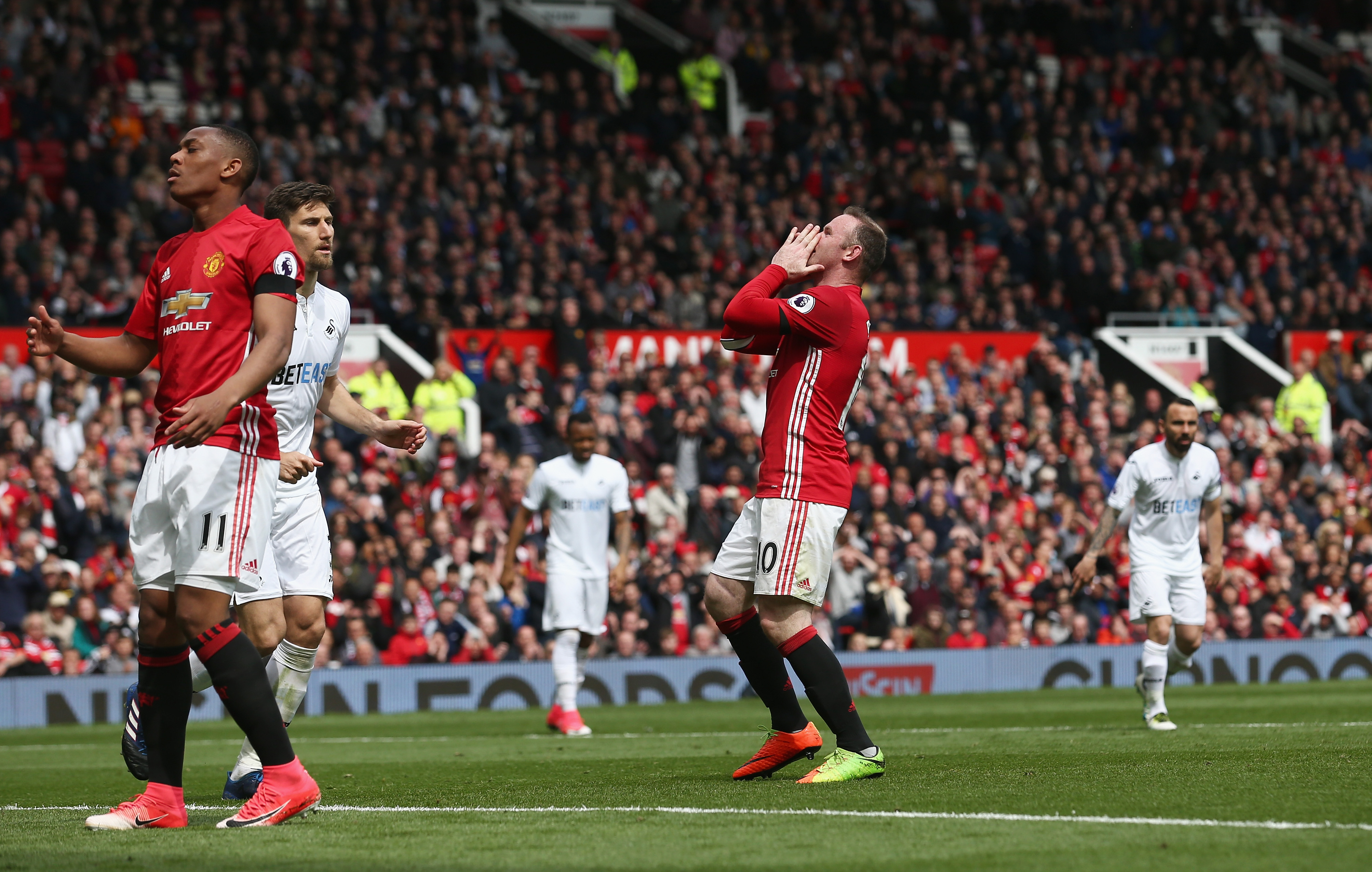 MANCHESTER, ENGLAND - APRIL 30: Wayne Rooney of Manchester United reacts during the Premier League match between Manchester United and Swansea City at Old Trafford on April 30, 2017 in Manchester, England.  (Photo by Jan Kruger/Getty Images)