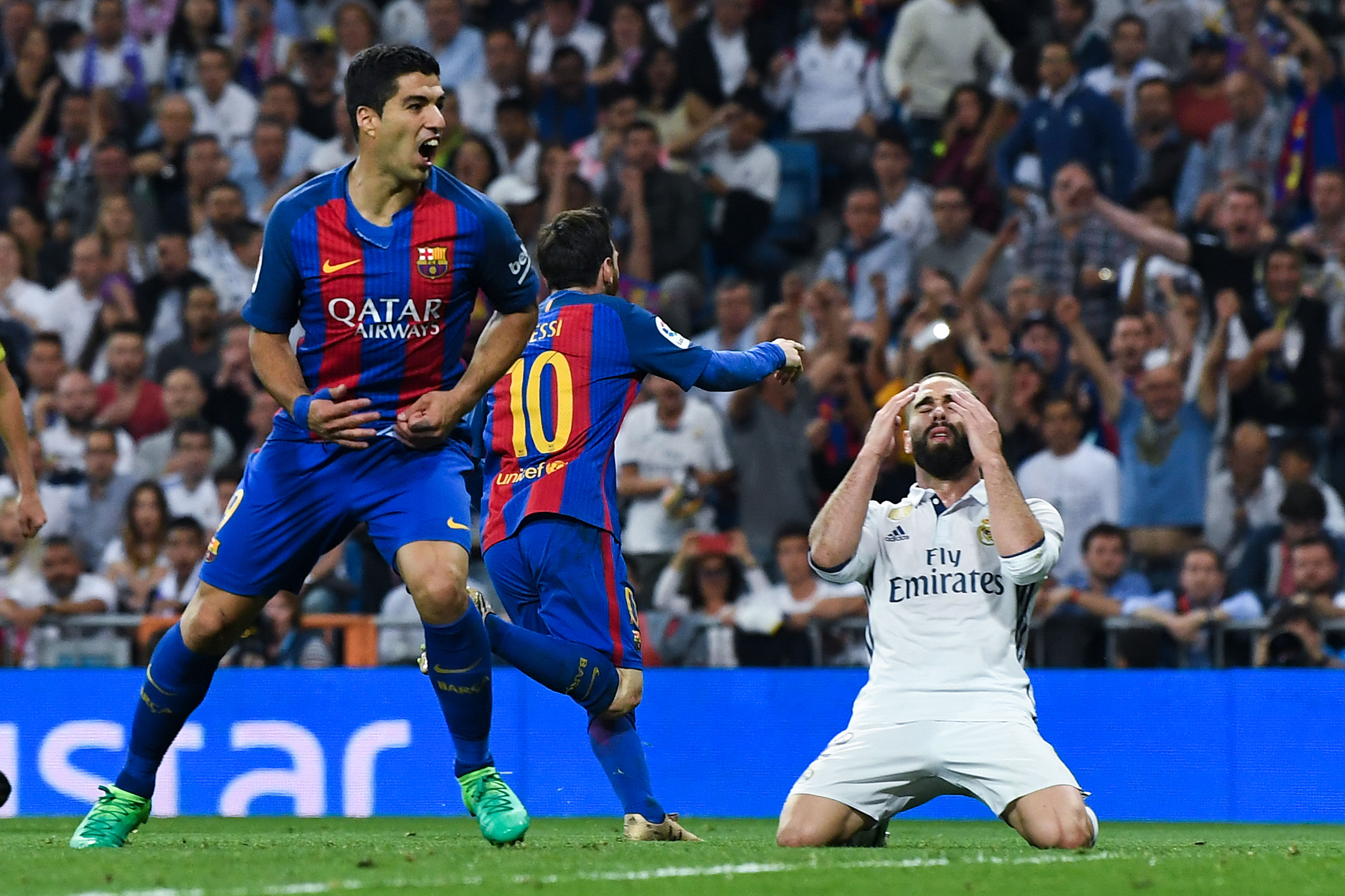 MADRID, SPAIN - APRIL 23:  Daniel Carvajal of Real Madrid CF reacts as Lionel Messi of FC Barcelona (10) celebrates after scoring his team's third goal during the La Liga match between Real Madrid CF and FC Barcelona at the Santiago Bernabeu stadium on April 23, 2017 in Madrid, Spain.  (Photo by David Ramos/Getty Images)