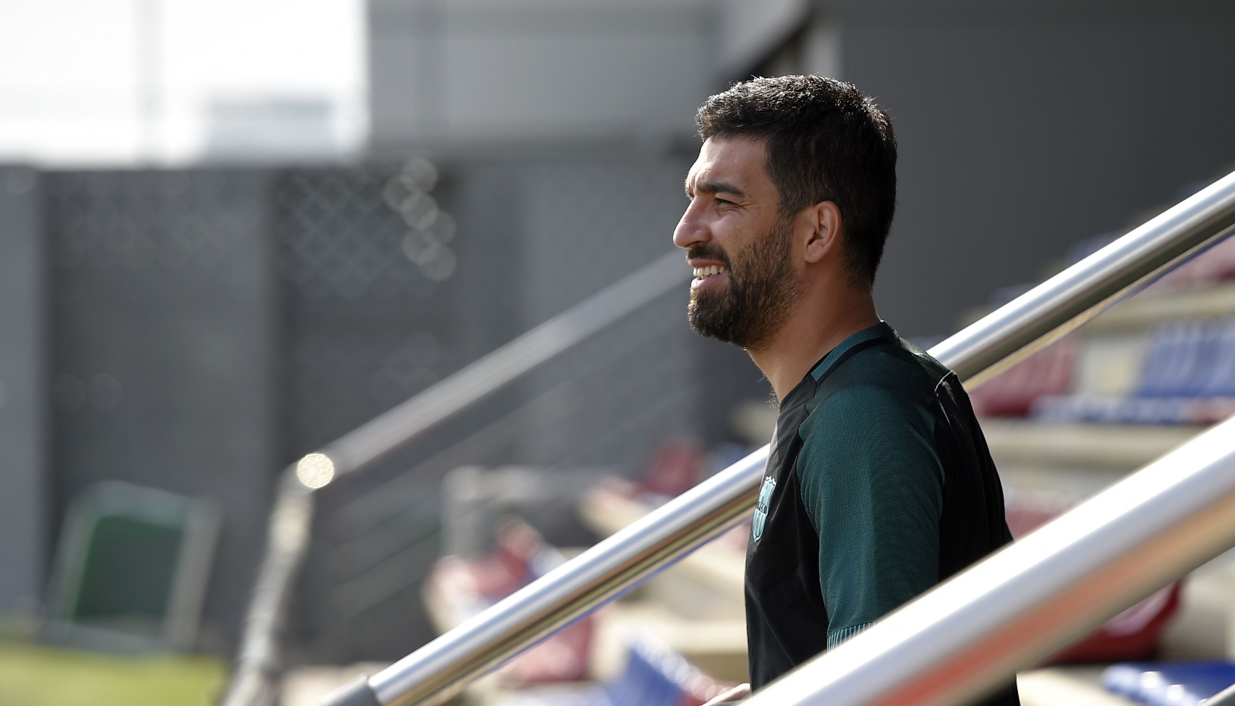 Barcelona's Turkish forward Arda Turan arrives for a training session at the Joan Gamper Sports Center in Sant Joan Despi, near Barcelona, on April 18, 2017 on the eve of the UEFA Champions League quarter-final second leg football match FC Barcelona vs Juventus. / AFP PHOTO / LLUIS GENE        (Photo credit should read LLUIS GENE/AFP/Getty Images)