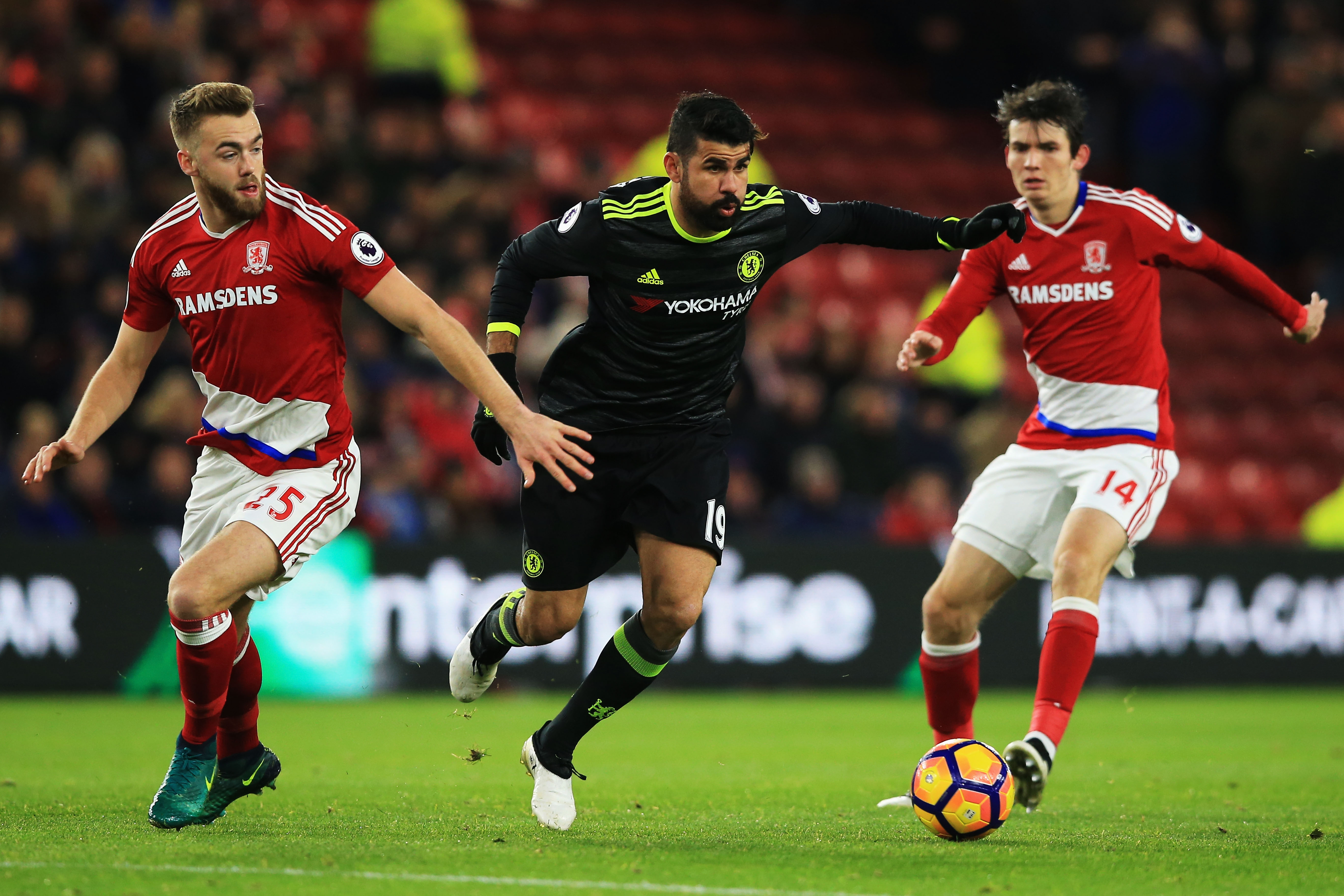 MIDDLESBROUGH, ENGLAND - NOVEMBER 20: Diego Costa of Chelsea is closed down by Calum Chambers (L) and Marten de Roon of Middlesbrough during the Premier League match between Middlesbrough and Chelsea at Riverside Stadium on November 20, 2016 in Middlesbrough, England. (Photo by Jan Kruger/Getty Images)