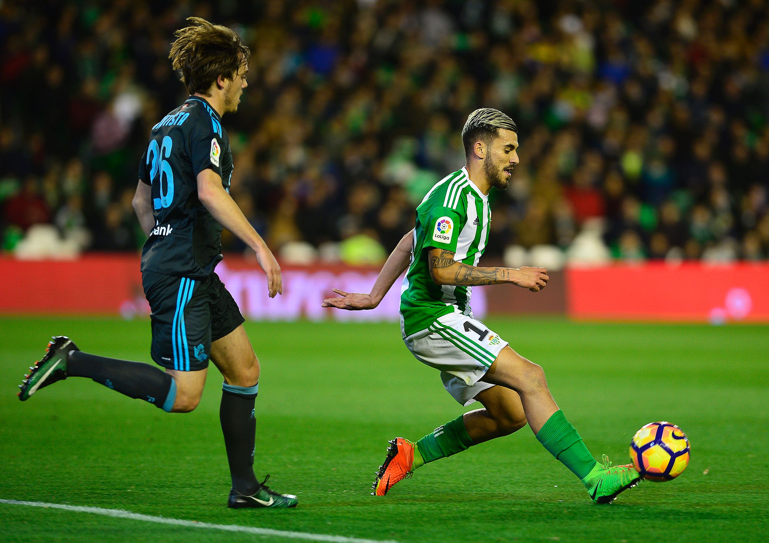 Real Sociedad's forward Jon Bautista (L) vies with Betis' forward Dani Ceballos during the Spanish league football match Real Betis vs Real Sociedad at the Benito Villamarin stadium in Sevilla on march 3, 2017. / AFP PHOTO / CRISTINA QUICLER        (Photo credit should read CRISTINA QUICLER/AFP/Getty Images)