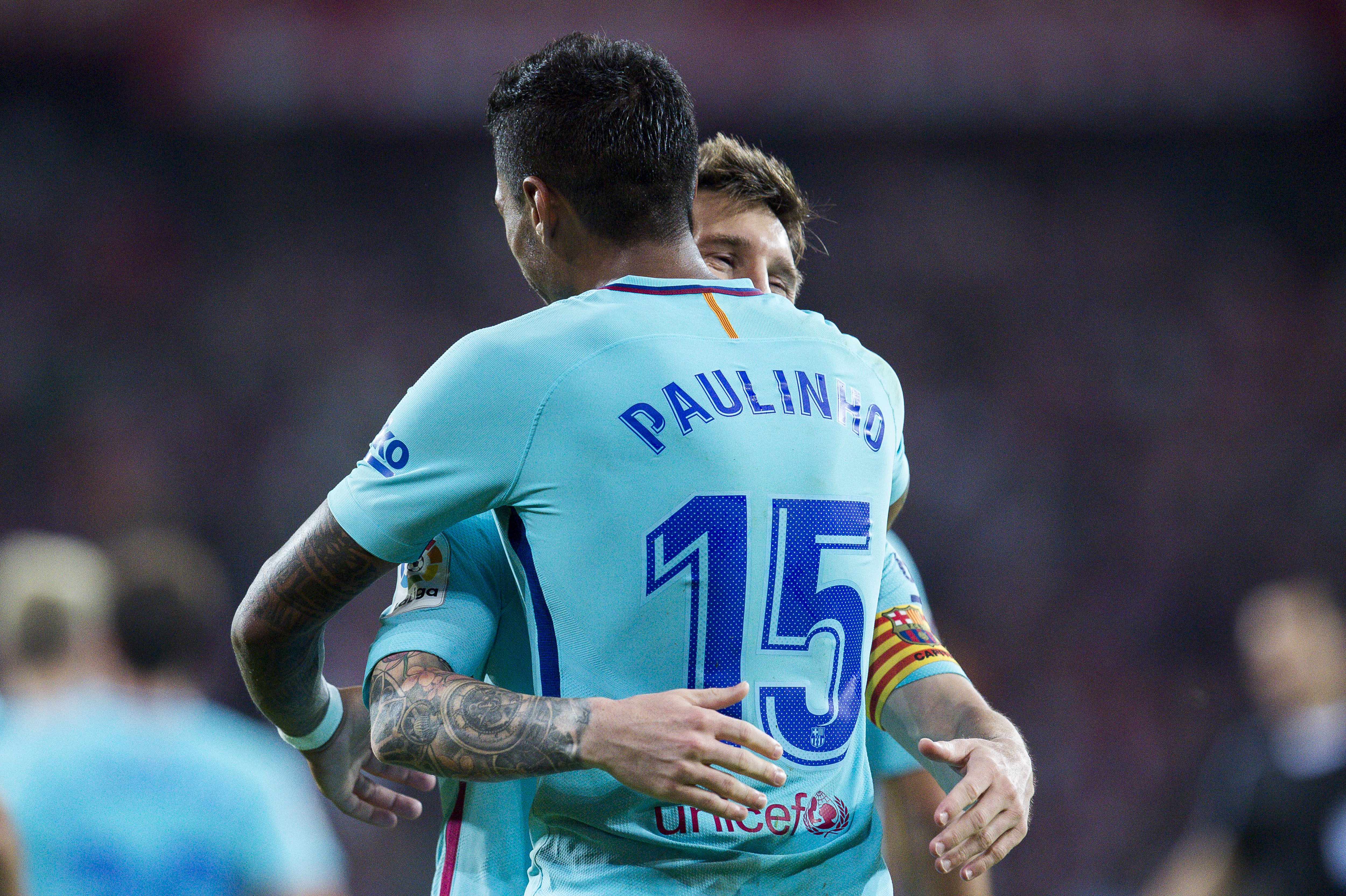 BILBAO, SPAIN - OCTOBER 28: Paulinho of FC Barcelona celebrates with his teammates Lionel Messi of FC Barcelona after scoring his team's second goal during the La Liga match between Athletic Club Bilbao and FC Barcelona at San Mames Stadium on October 28, 2017 in Bilbao, Spain. (Photo by Juan Manuel Serrano Arce/Getty Images)