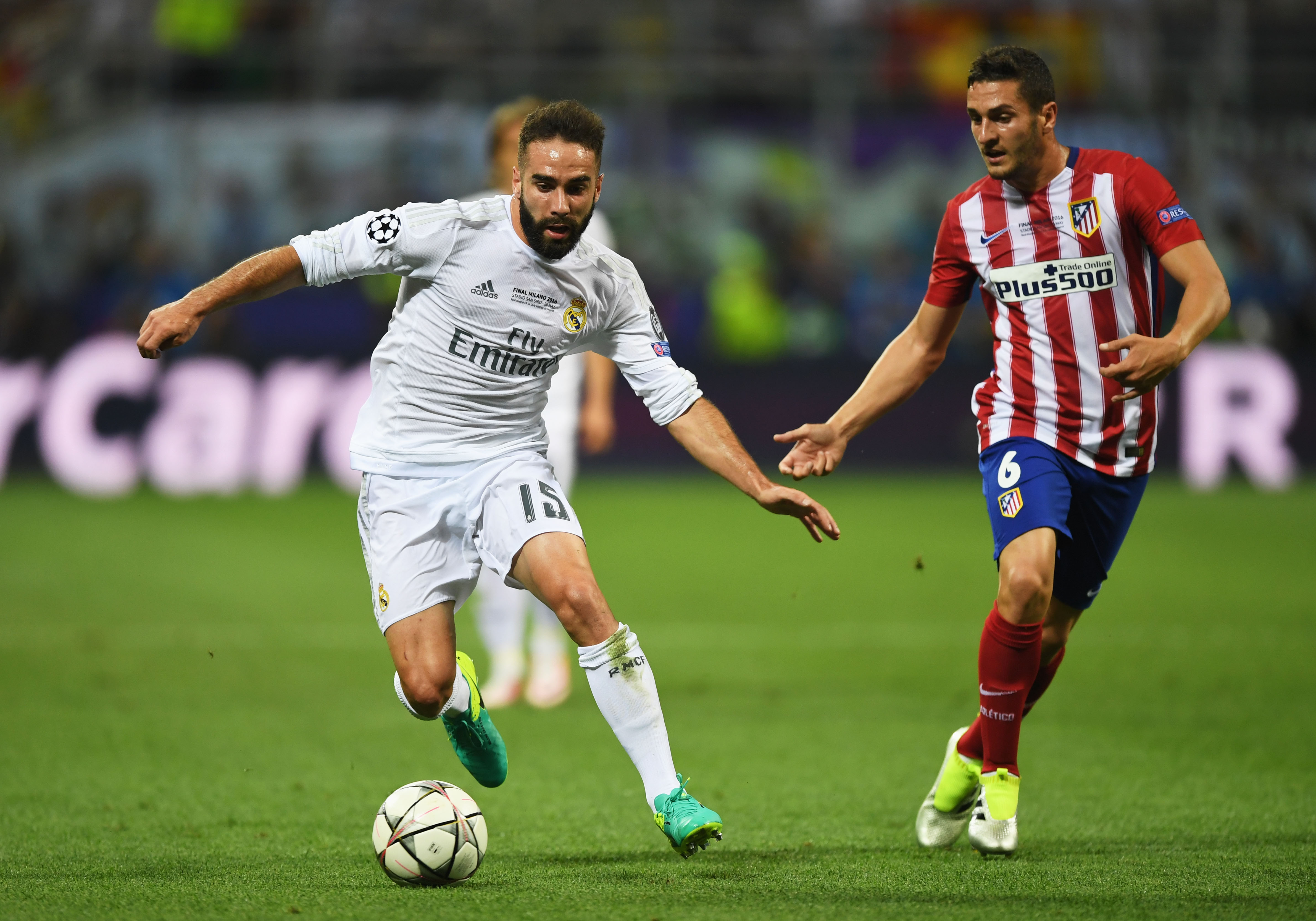 MILAN, ITALY - MAY 28: Dani Carvajal of Real Madrid is challenged by Koke of Atletico Madrid  during the UEFA Champions League Final match between Real Madrid and Club Atletico de Madrid at Stadio Giuseppe Meazza on May 28, 2016 in Milan, Italy.  (Photo by Shaun Botterill/Getty Images)
