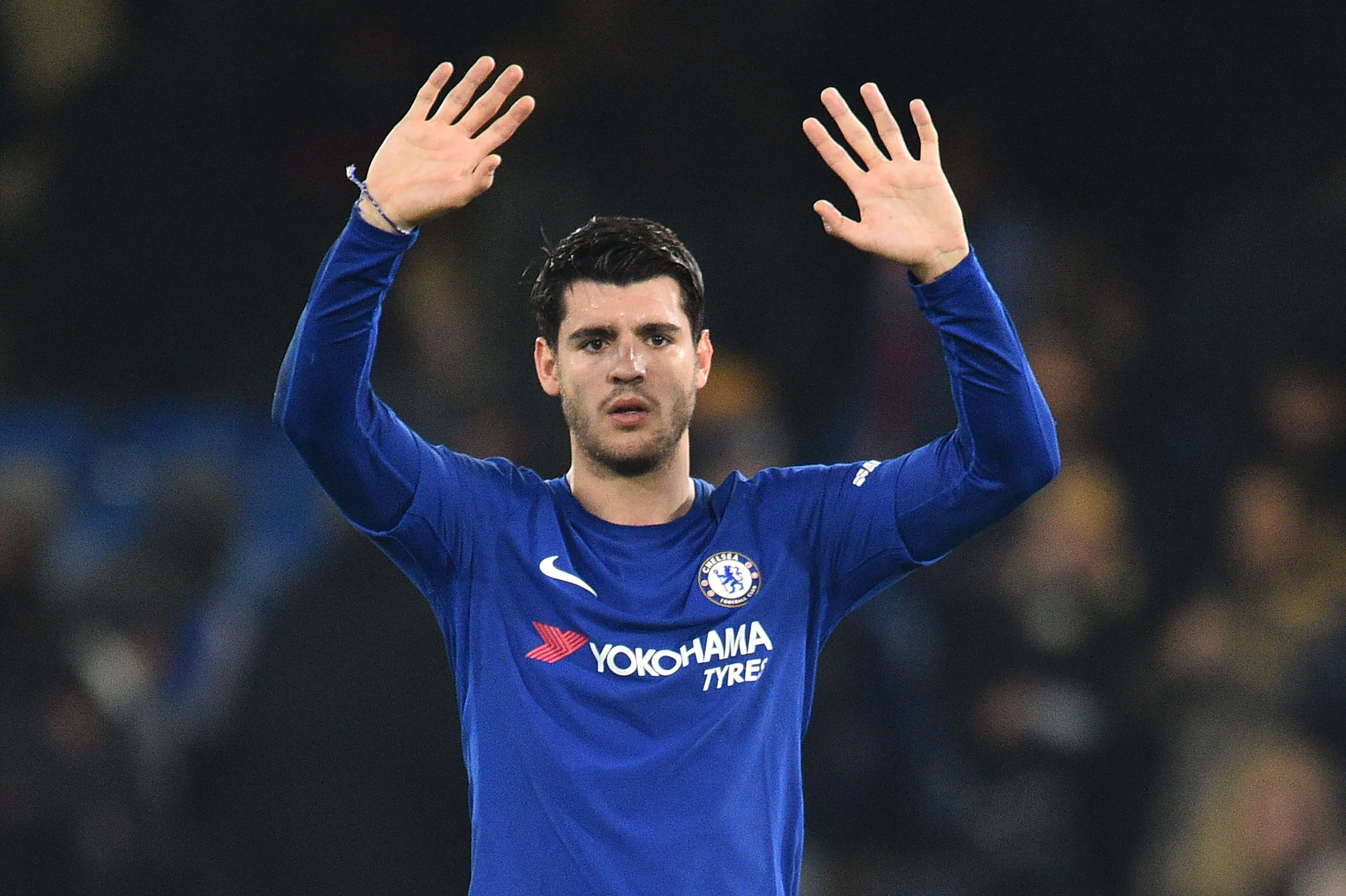 Chelsea's Spanish striker Alvaro Morata celebrates after the English League Cup quarter-final football match between Chelsea and Bournemouth at Stamford Bridge Stadium, in southwest London on December 20, 2017. / AFP PHOTO / Glyn KIRK / RESTRICTED TO EDITORIAL USE. No use with unauthorized audio, video, data, fixture lists, club/league logos or 'live' services. Online in-match use limited to 75 images, no video emulation. No use in betting, games or single club/league/player publications.  /         (Photo credit should read GLYN KIRK/AFP/Getty Images)