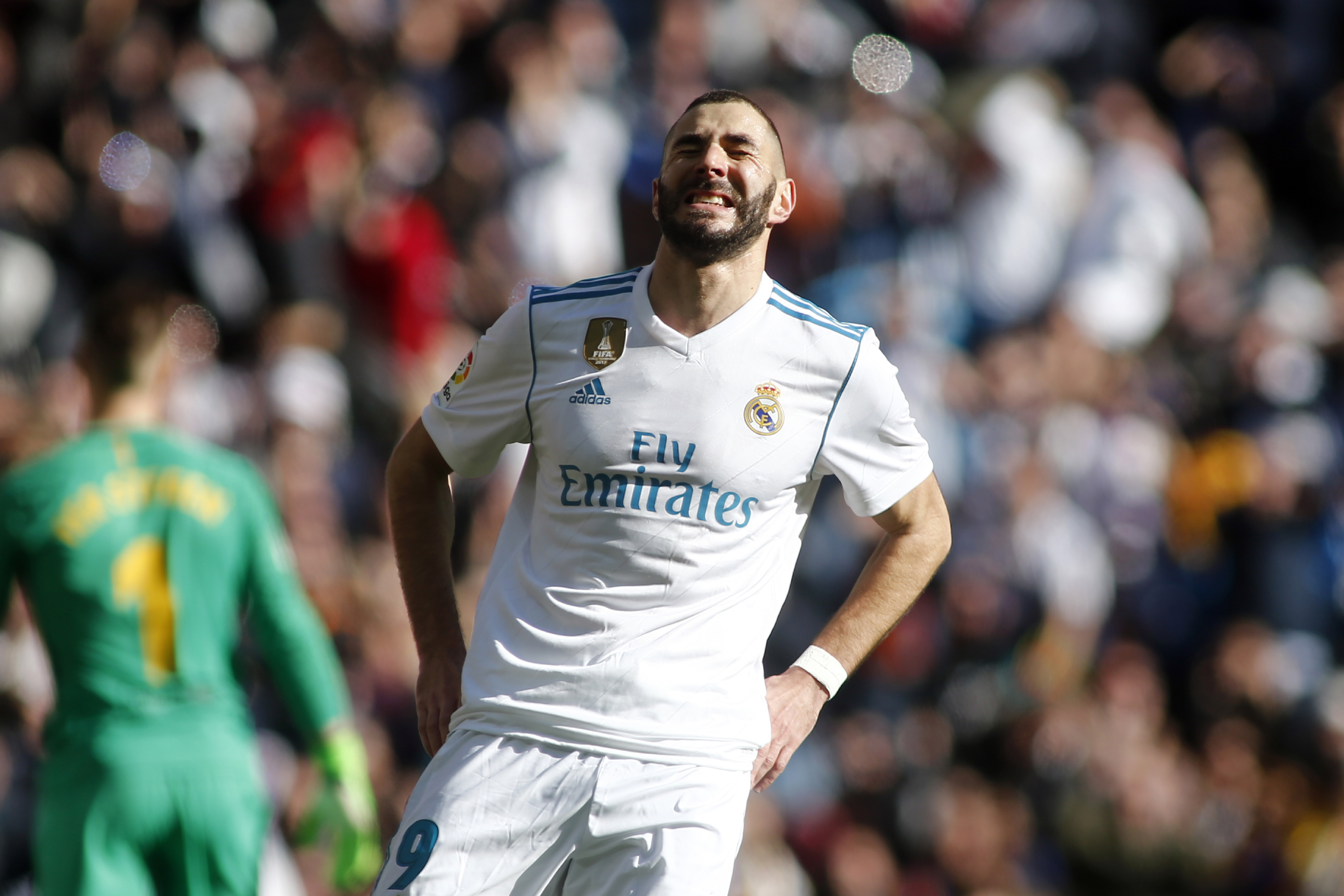Real Madrid's French forward Karim Benzema reacts during the Spanish League "Clasico" football match Real Madrid CF vs FC Barcelona at the Santiago Bernabeu stadium in Madrid on December 23, 2017.  / AFP PHOTO / OSCAR DEL POZO        (Photo credit should read OSCAR DEL POZO/AFP/Getty Images)