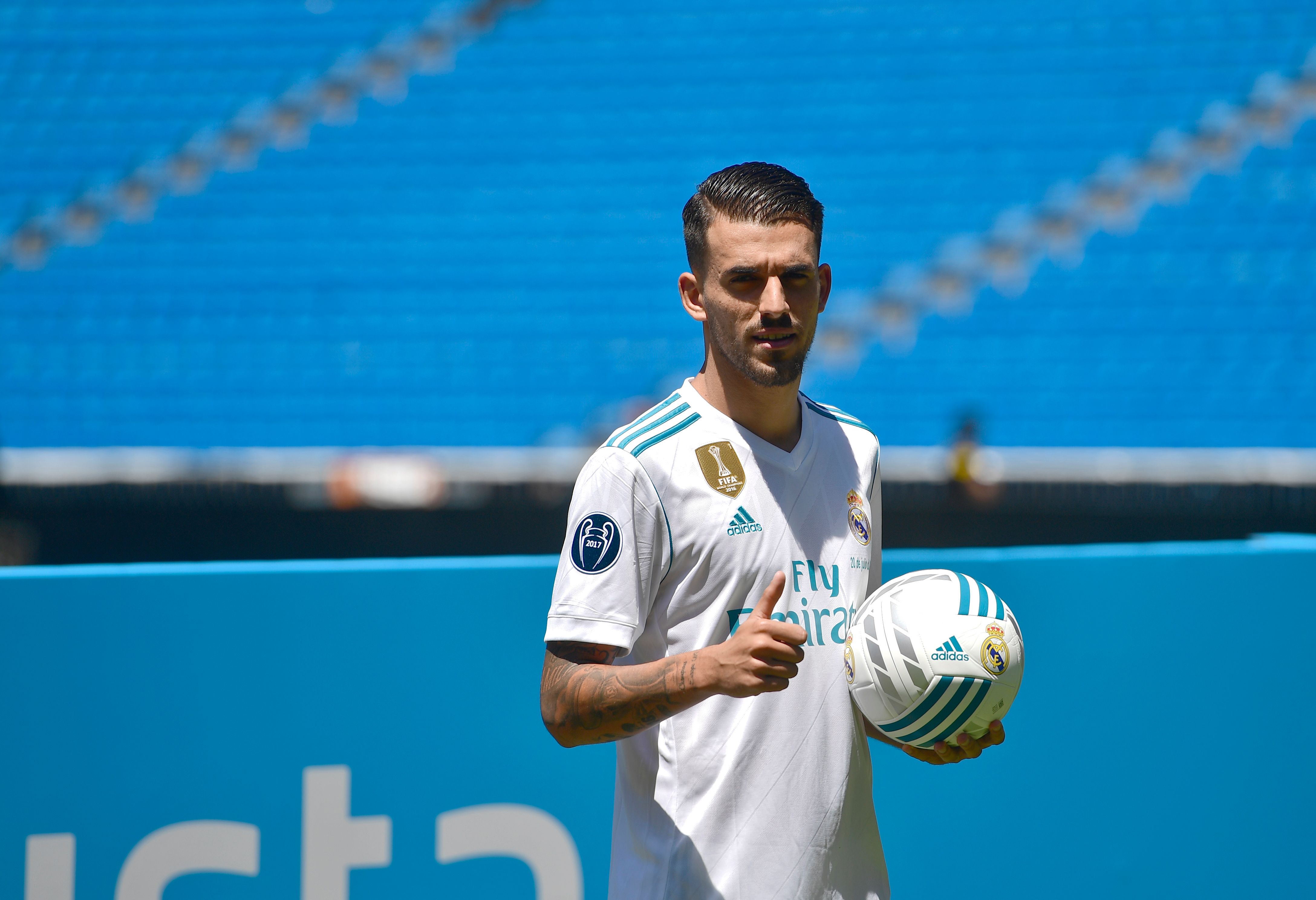 Spanish midfielder Dani Ceballos gives a thumb up as he poses on the pitch during his presentation as new football player of the Real Madrid CF at the Santiago Bernabeu stadium in Madrid on July 20, 2017. / AFP PHOTO / PIERRE-PHILIPPE MARCOU (Photo credit should read PIERRE-PHILIPPE MARCOU/AFP/Getty Images)