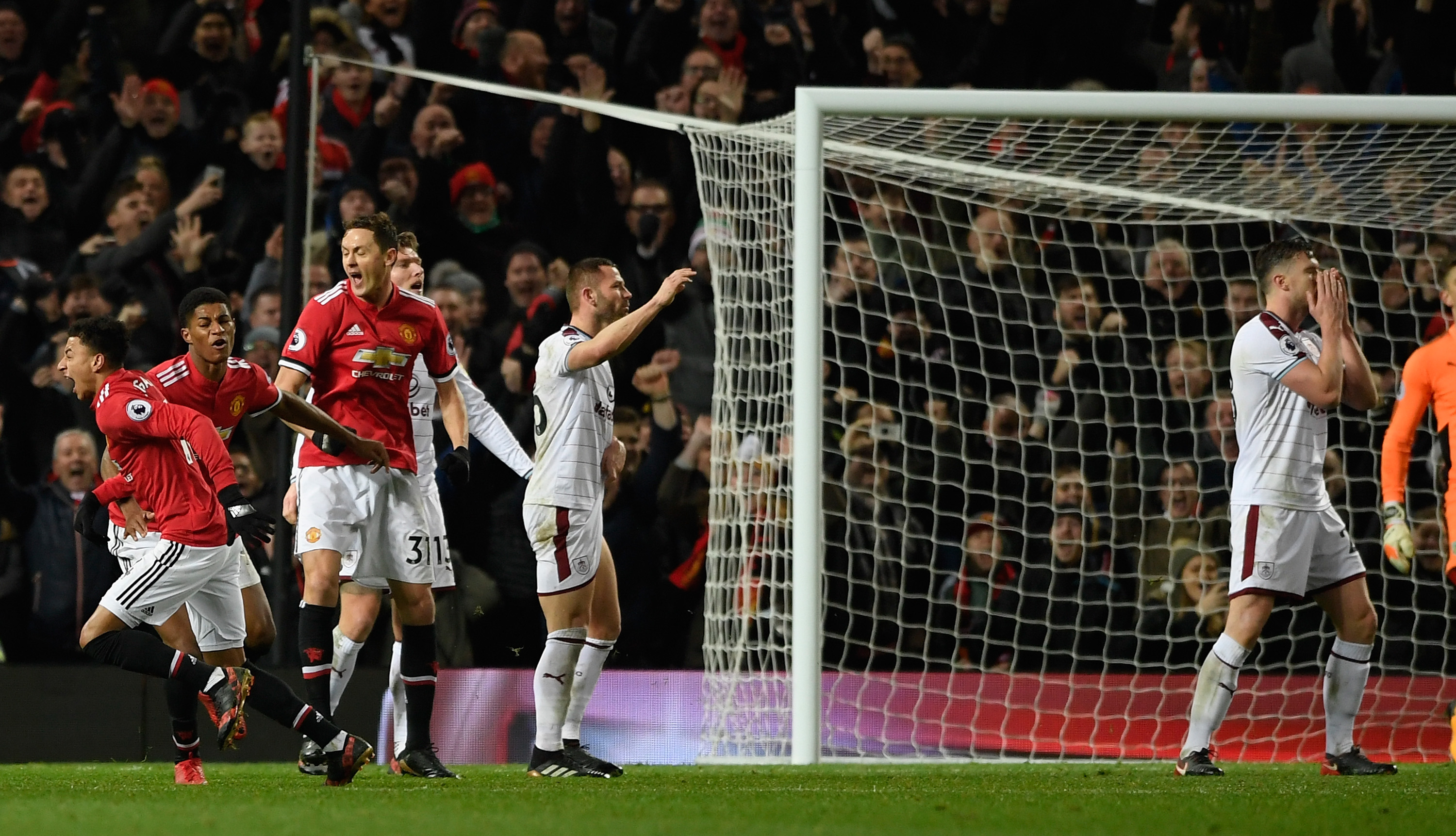 MANCHESTER, ENGLAND - DECEMBER 26:  United player Jesse Lingard celebrates his late equalising goal during the Premier League match between Manchester United and Burnley at Old Trafford on December 26, 2017 in Manchester, England.  (Photo by Stu Forster/Getty Images)