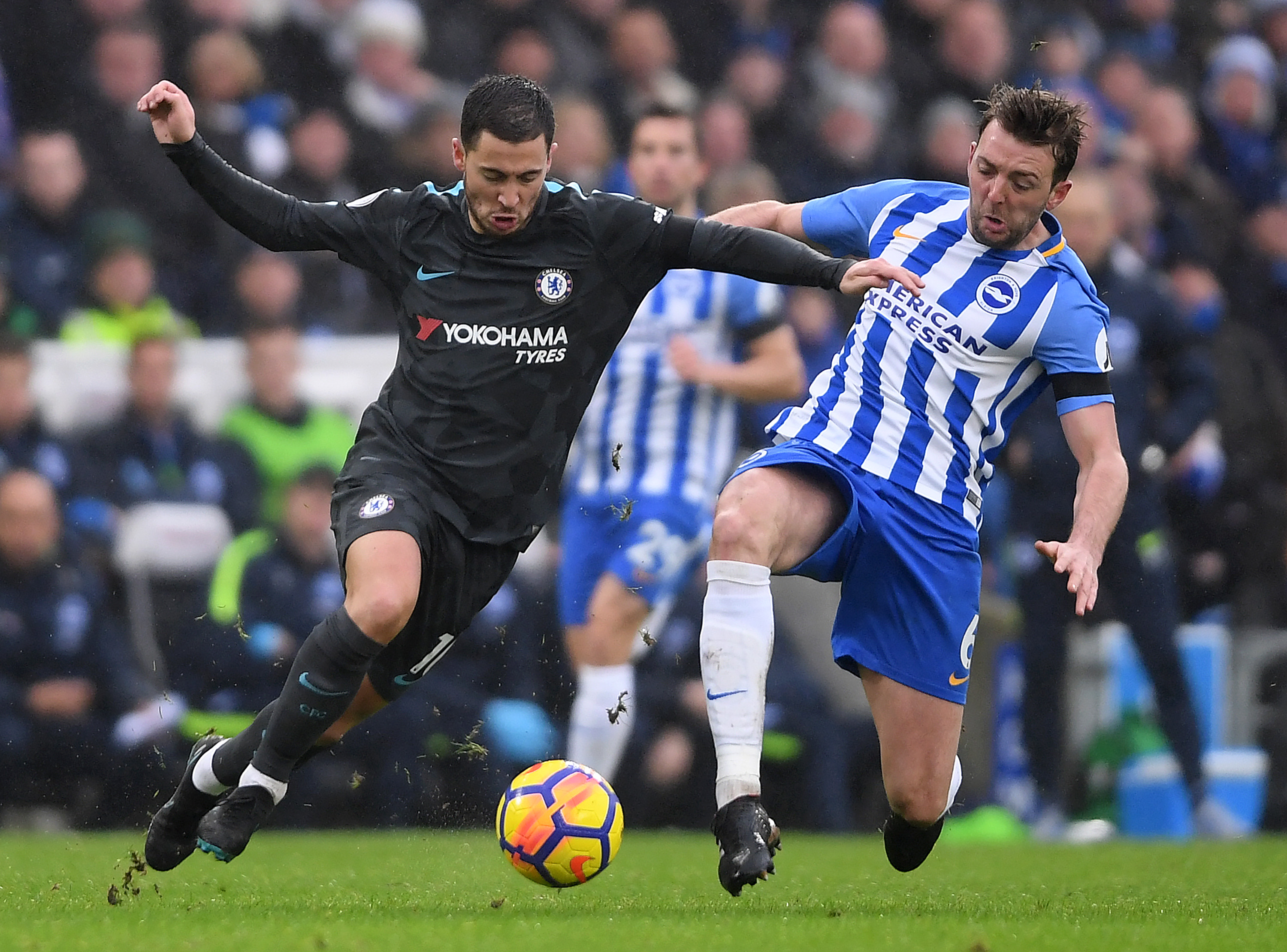 BRIGHTON, ENGLAND - JANUARY 20:  Eden Hazard of Chelsea gets past Dale Stephens of Brighton during the Premier League match between Brighton and Hove Albion and Chelsea at Amex Stadium on January 20, 2018 in Brighton, England.  (Photo by Mike Hewitt/Getty Images)