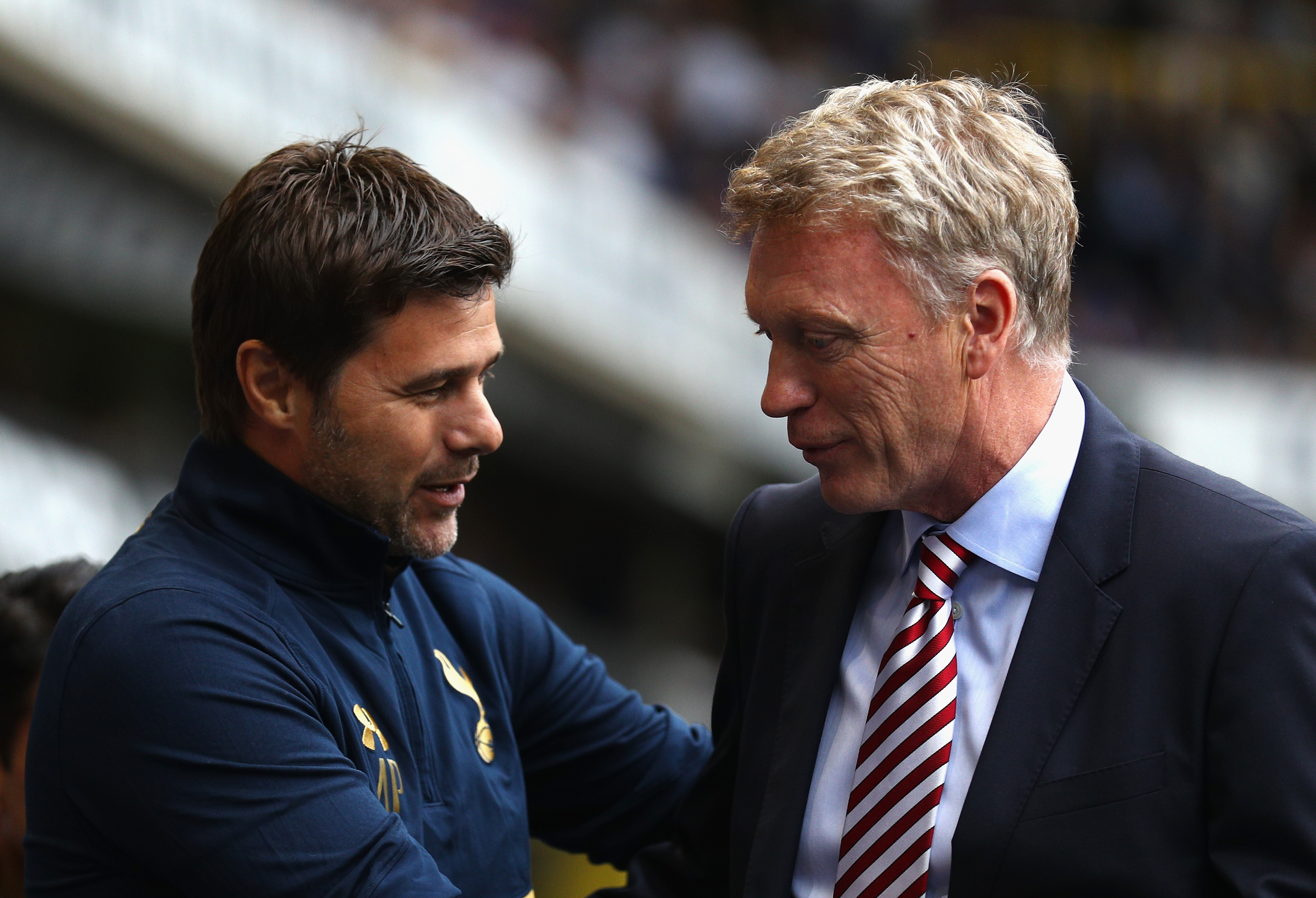 LONDON, ENGLAND - SEPTEMBER 18: Mauricio Pochettino, Manager of Tottenham Hotspur (L) and David Moyes, Manager of Sunderland (R) embrace before kick off during the Premier League match between Tottenham Hotspur and Sunderland at White Hart Lane on September 18, 2016 in London, England. (Photo by Paul Gilham/Getty Images)