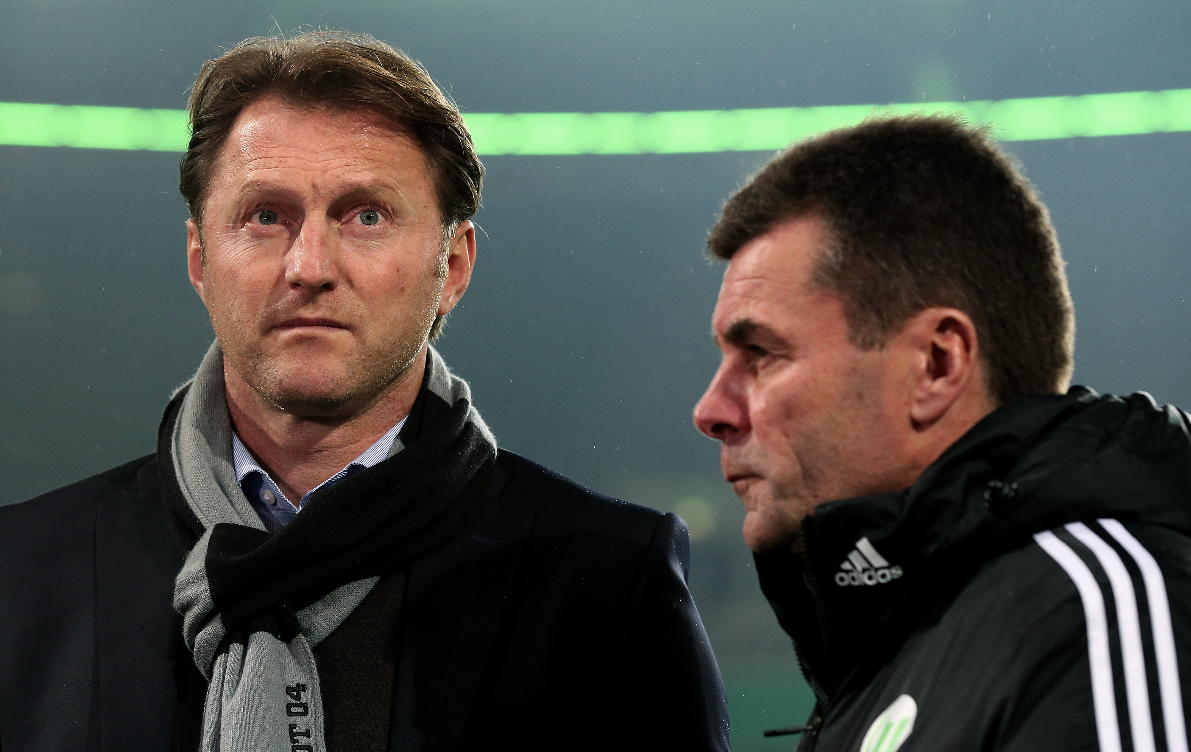 WOLFSBURG, GERMANY - DECEMBER 04: Headcoach Ralph Hasenhuettl (L) of Ingolstadt and headcoach Dieter Hecking of Wolfsburg prior to the DFB Cup round of 16 match between VfL Wolfsburg and FC Ingolstadt at Volkswagen Arena on December 04, 2013 in Wolfsburg, Germany. (Photo by Ronny Hartmann/Bongarts/Getty Images)