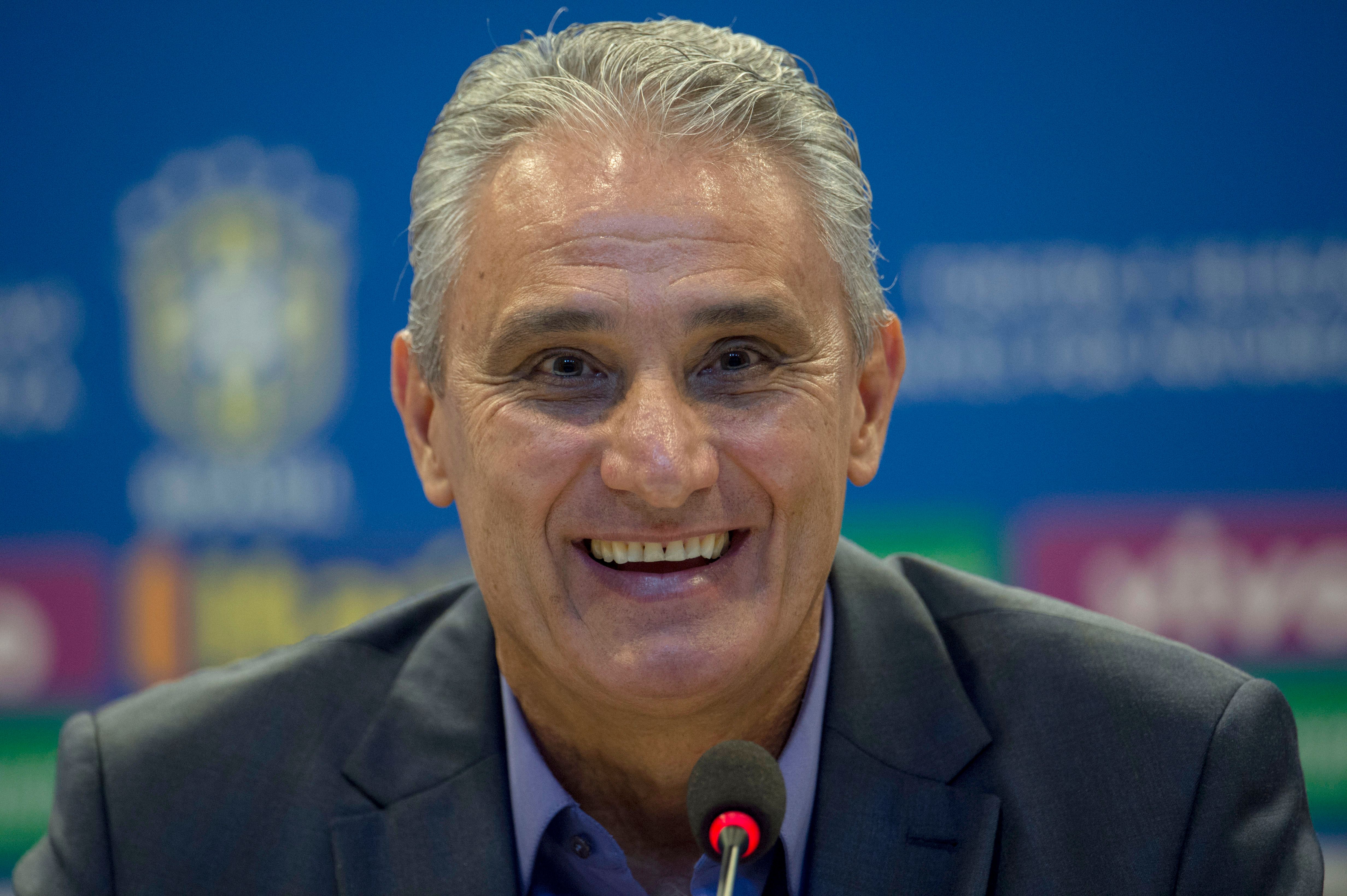 Brazilian football team head coach Tite, smiles during a press conference to announce the list of players for the upcoming friendly matches against Russia and Germany in preparation ahead of Russia 2018 World Cup, at the CBF (Brazilian Football Confederation) headquarters in Rio de Janeiro, Brazil on March 12, 2018. / AFP PHOTO / Mauro Pimentel (Photo credit should read MAURO PIMENTEL/AFP/Getty Images)