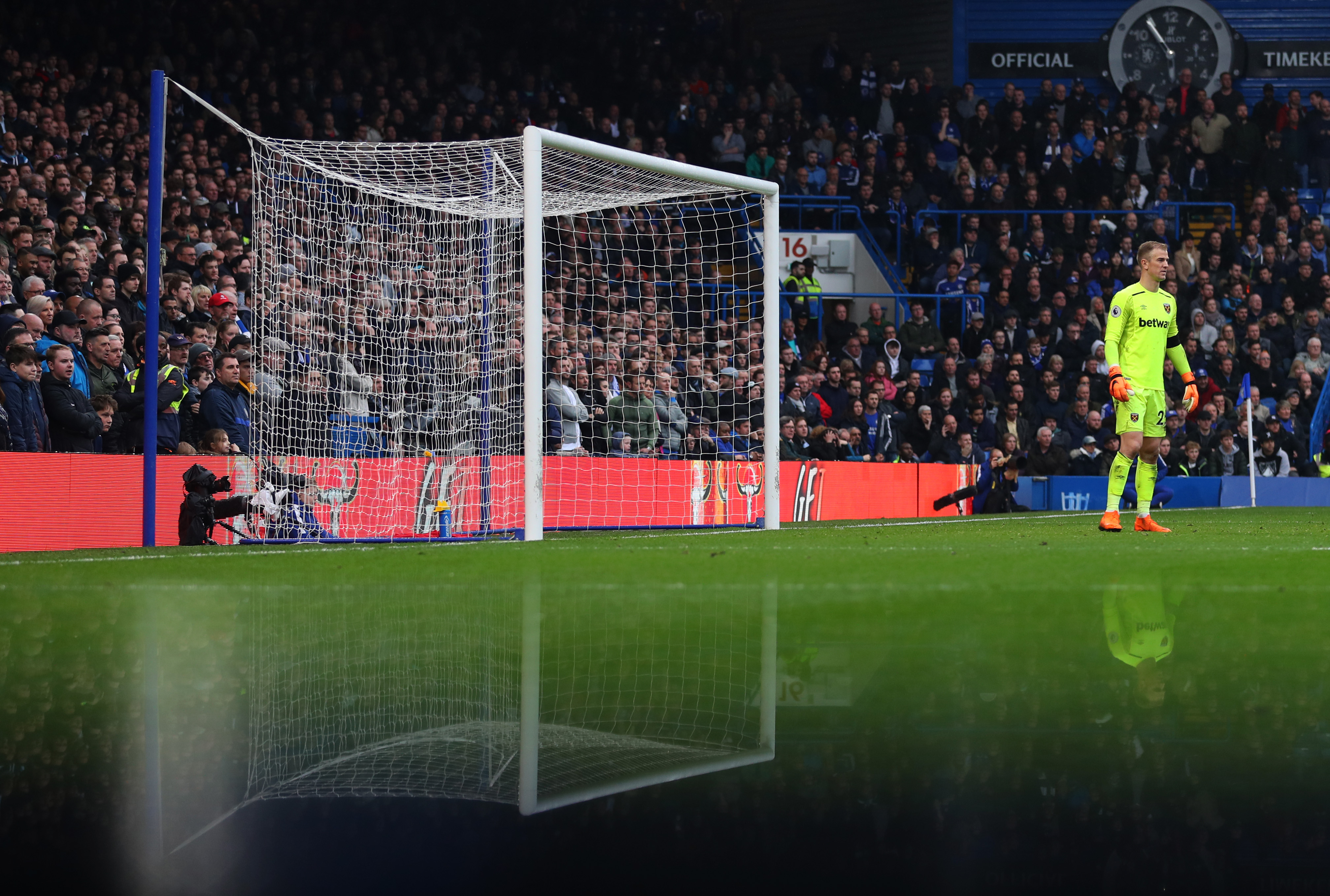 LONDON, ENGLAND - APRIL 08: A reflection can be seen of Joe Hart of West Ham United during the Premier League match between Chelsea and West Ham United at Stamford Bridge on April 8, 2018 in London, England. (Photo by Catherine Ivill/Getty Images)