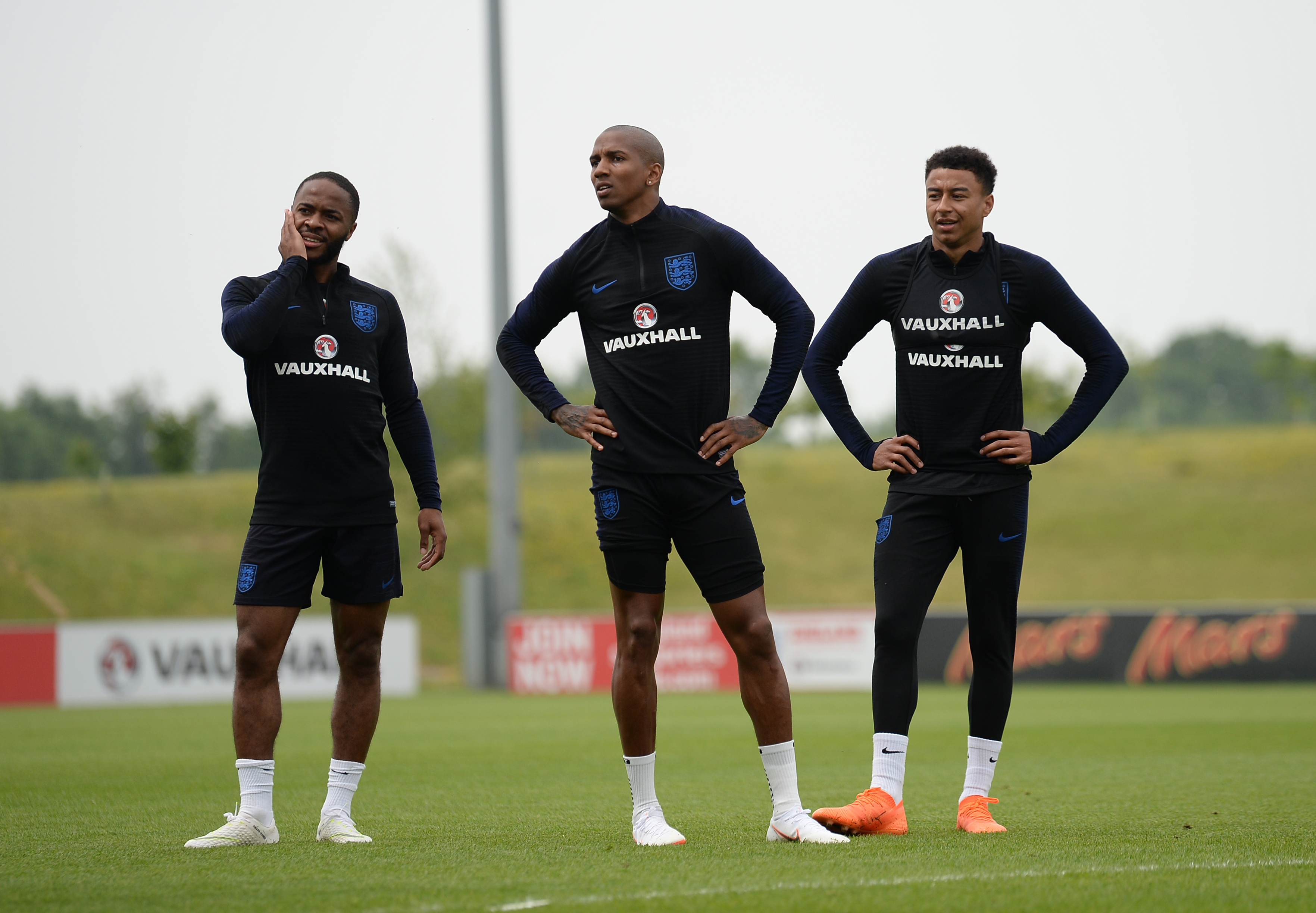 BURTON-UPON-TRENT, ENGLAND - MAY 28: Raheem Sterling, Ashley Young and Jesse Lingard take part in an England training session at St Georges Park on May 28, 2018 in Burton-upon-Trent, England. (Photo by Nathan Stirk/Getty Images)