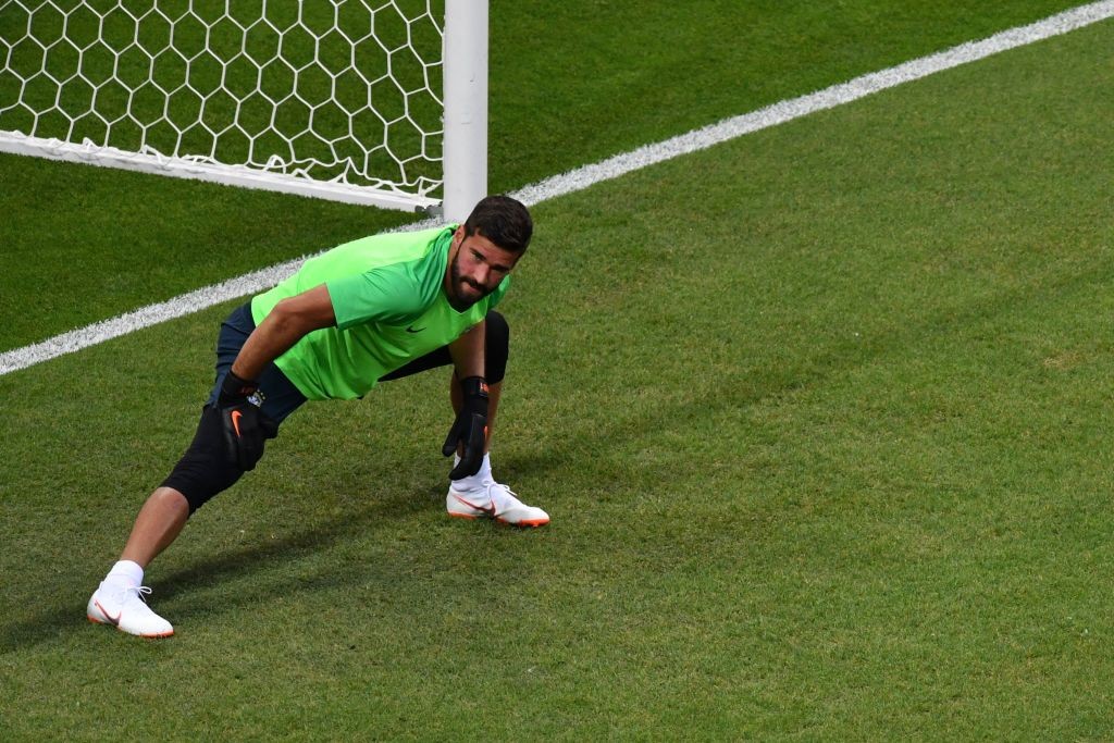 Brazil's goalkeeper Alisson warms up before the Russia 2018 World Cup quarter-final football match between Brazil and Belgium at the Kazan Arena in Kazan on July 6, 2018. (Photo by SAEED KHAN / AFP) / RESTRICTED TO EDITORIAL USE - NO MOBILE PUSH ALERTS/DOWNLOADS (Photo credit should read SAEED KHAN/AFP/Getty Images)