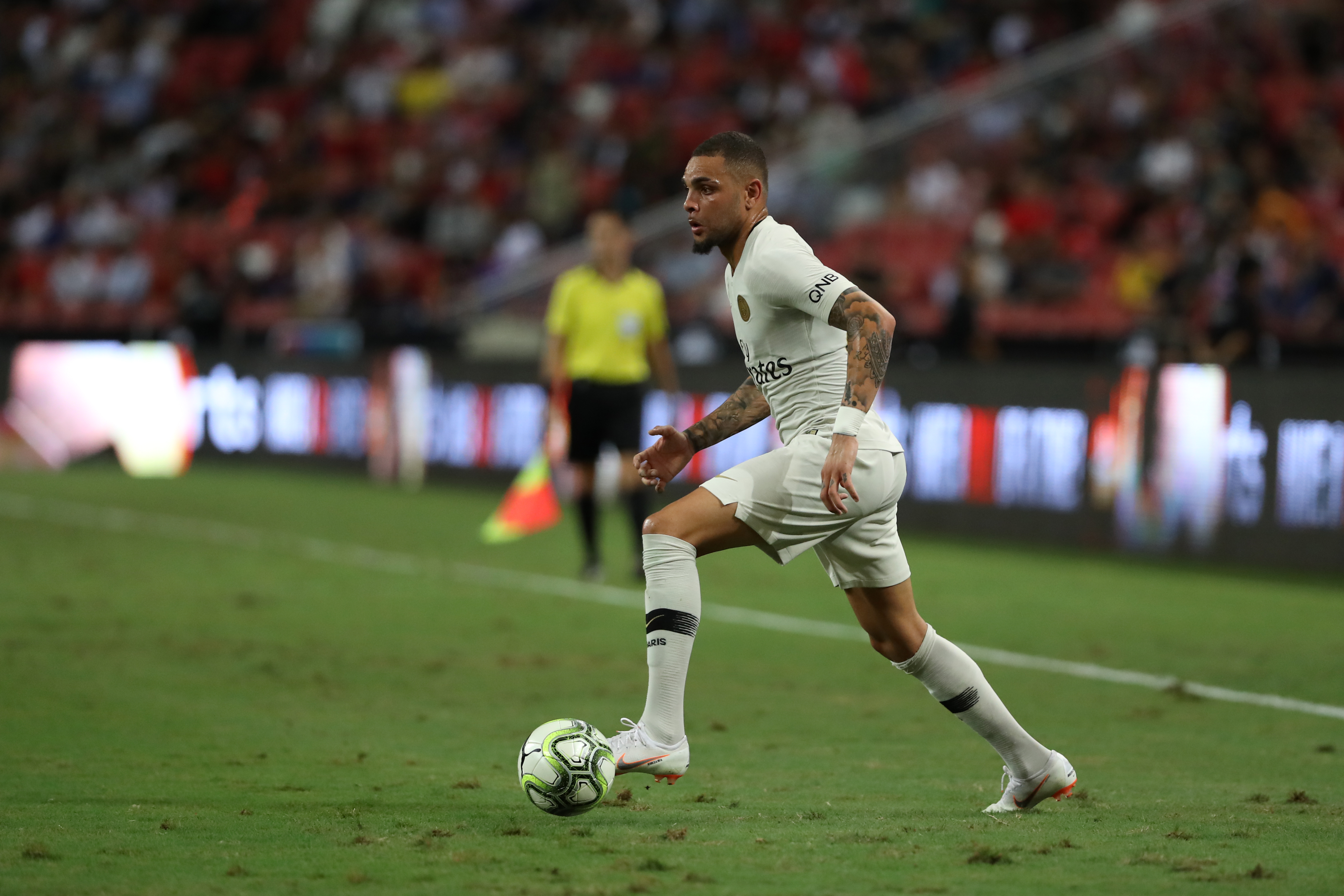 SINGAPORE, SINGAPORE - JULY 30: Layvin Kurzawa of Paris Saint Germain controls the ball during the International Champions Cup match between Paris Saint Germain and Club de Atletico Madrid at the National Stadium on July 30, 2018 in Singapore. (Photo by Lionel Ng/Getty Images)