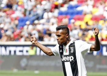 HARRISON, NJ - JULY 28: Alex Sandro #12 of Juventus celebrates his game winning goal in penalty kicks against Benfica during the International Champions Cup 2018 match between Benfica and Juventus at Red Bull Arena on July 28, 2018 in Harrison, New Jersey. (Photo by Adam Hunger/Getty Images)