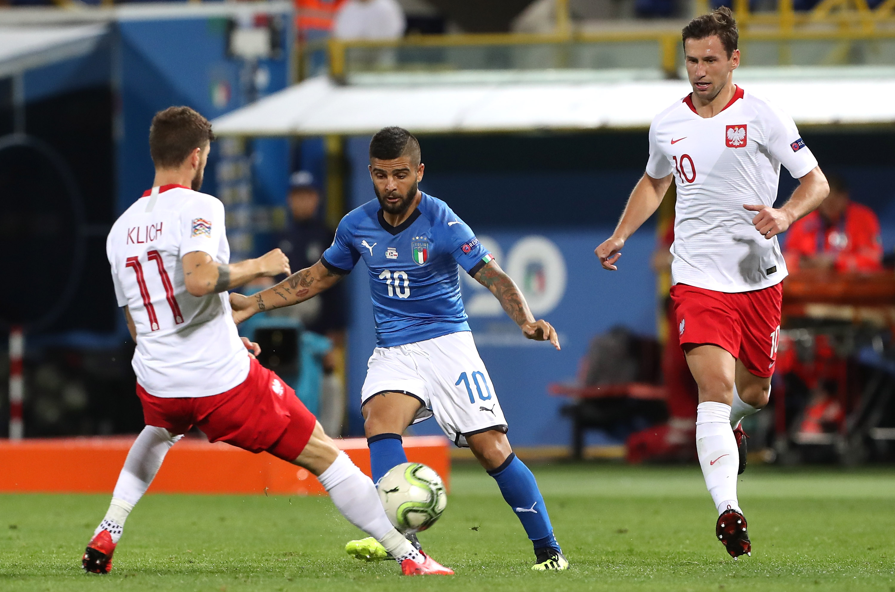 BOLOGNA, ITALY - SEPTEMBER 07: Lorenzo Insigne of Italy competes for the ball against Mateusz Klich of Poland during the UEFA Nations League A group three match between Italy and Poland at Stadio Renato Dall'Ara on September 7, 2018 in Bologna, Italy. (Photo by Marco Luzzani/Getty Images)